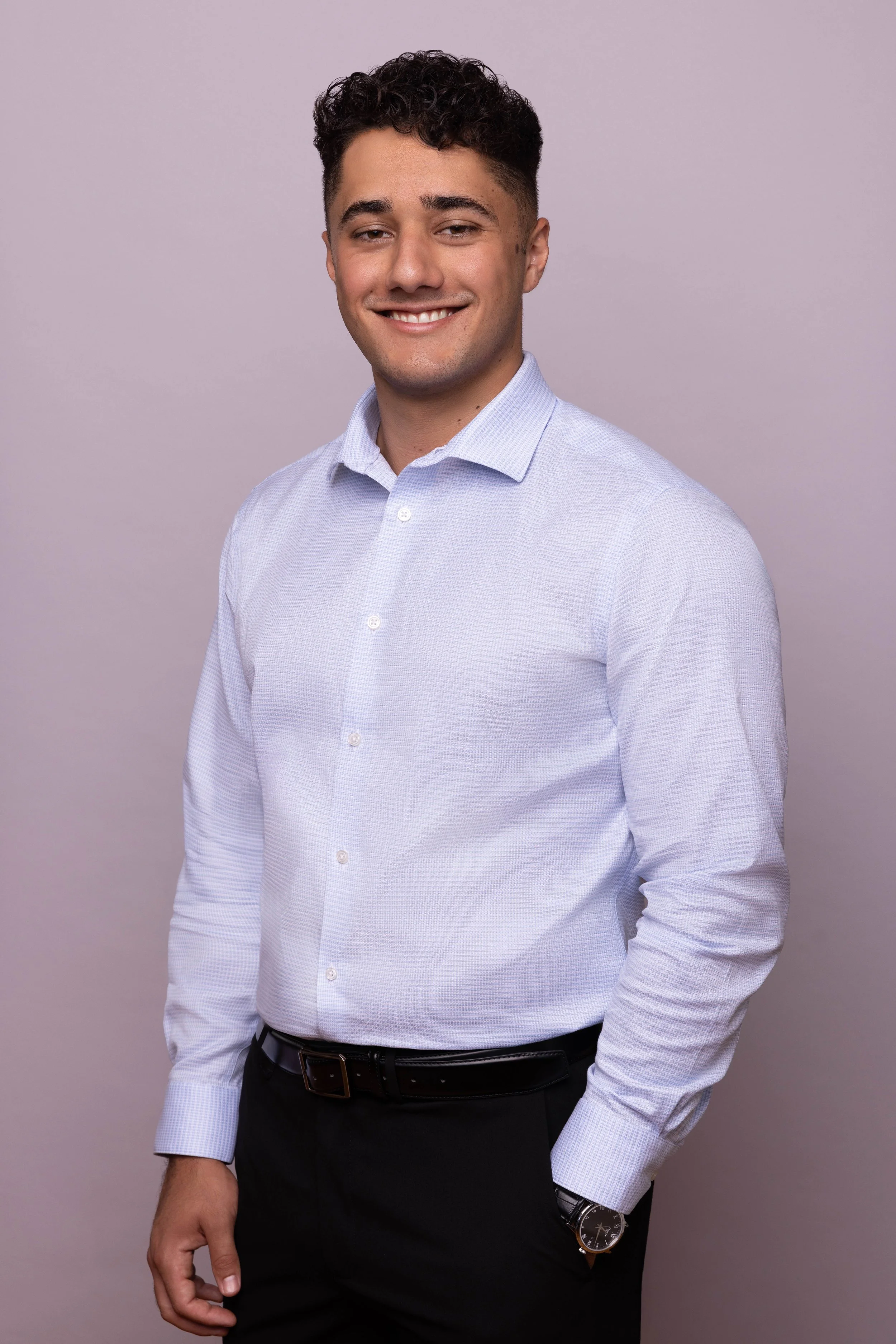 Professional studio headshot of a medical professional in San Diego with a clean backdrop
