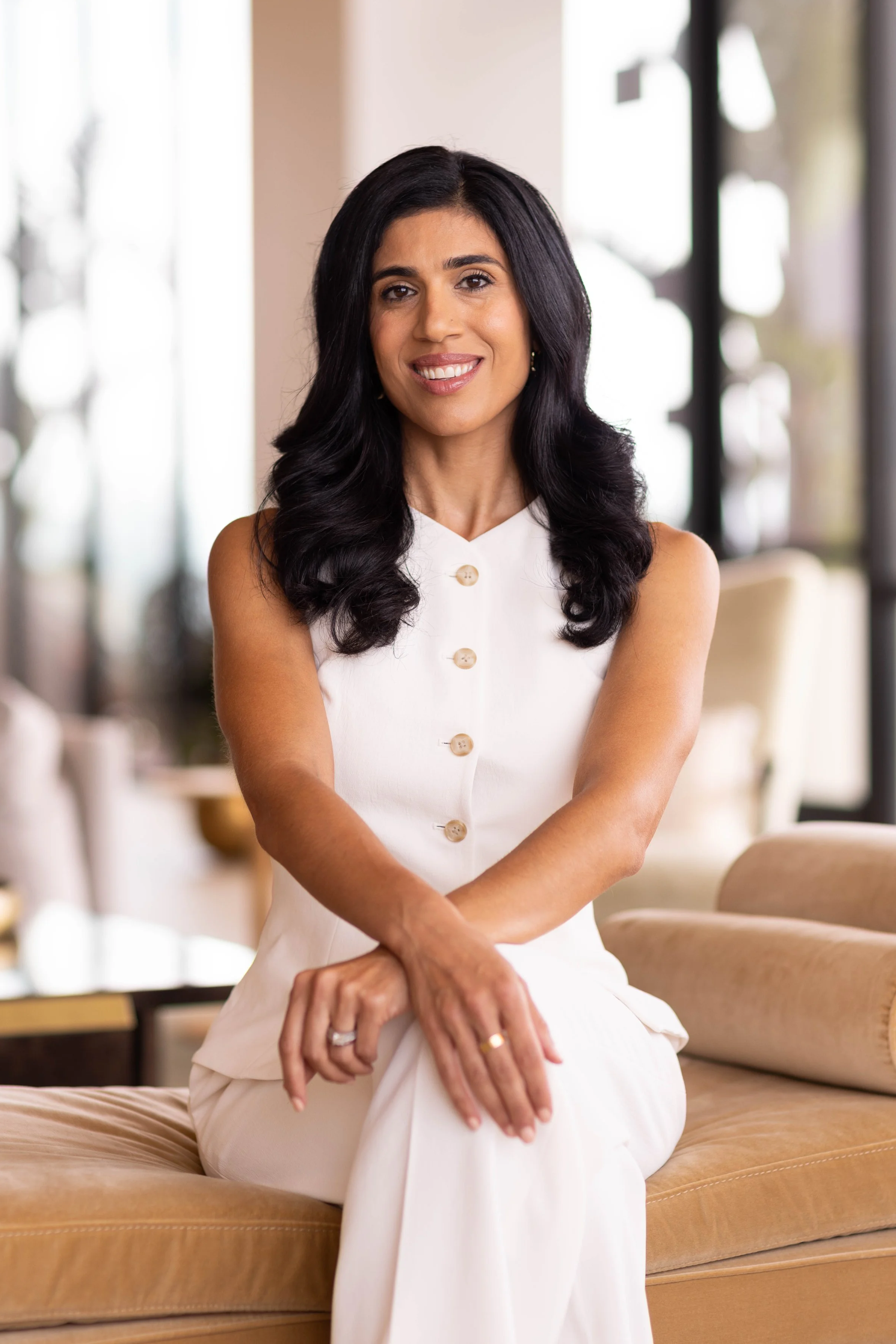 Professional business headshot of a real estate professional in San Diego photographed with a clean, modern look