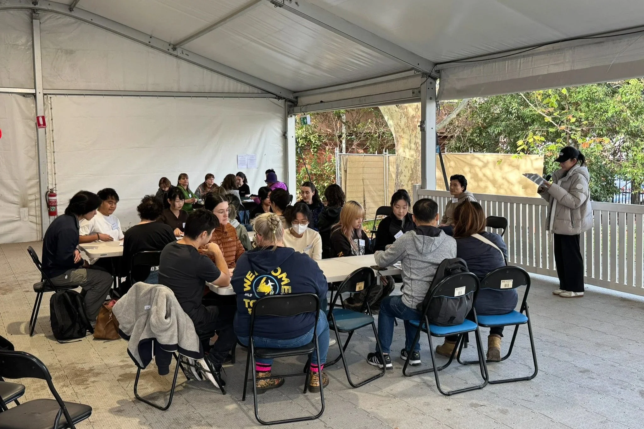  Danni Lin and Zeejay Tan introducing the workshop activities and conservation process to volunteers at See Yup Temple. Photo: Sophie Couchman 