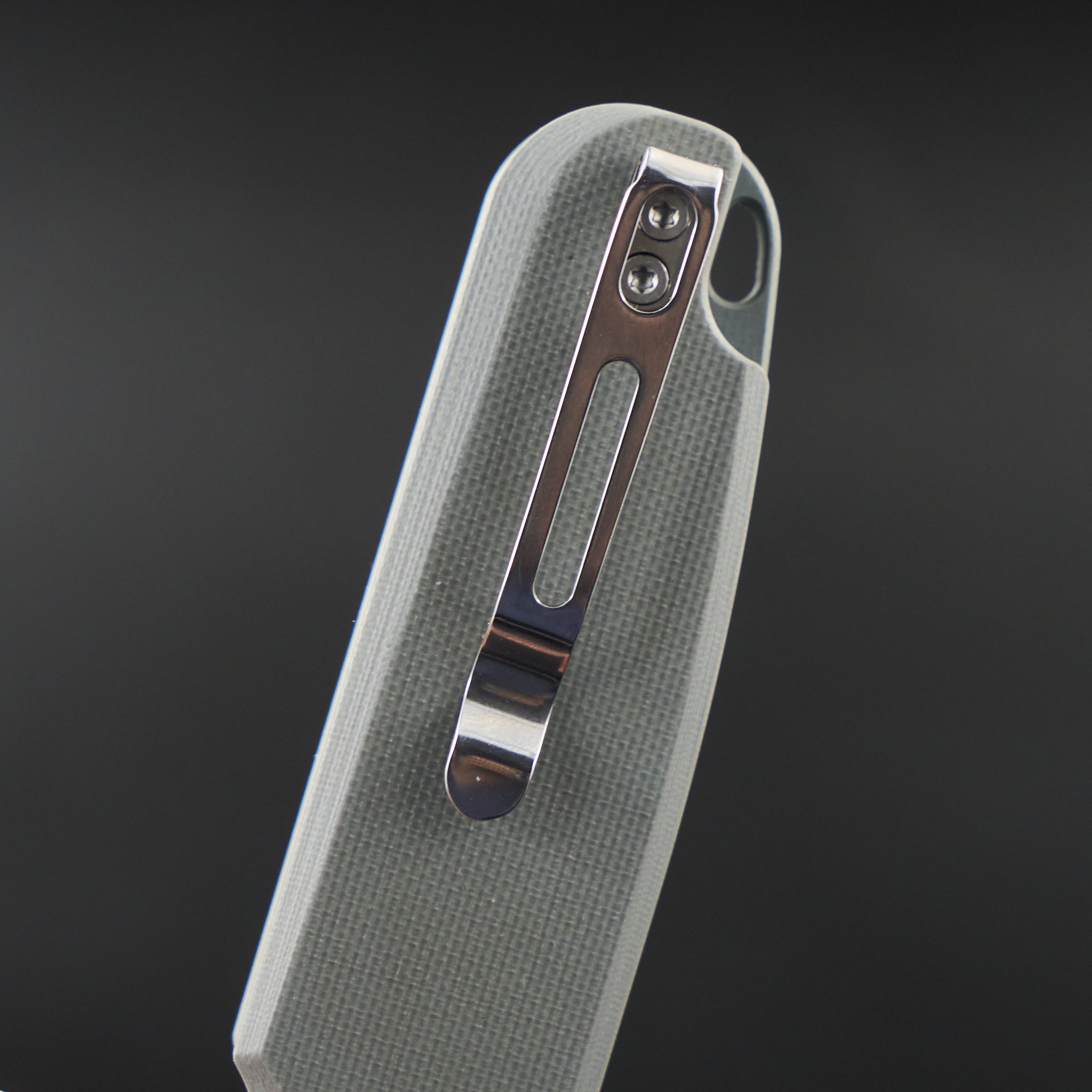 Close-up of the Rapax Buddy handle and deep-carry pocket clip.