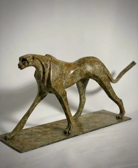 the small walking cheetah- bronze