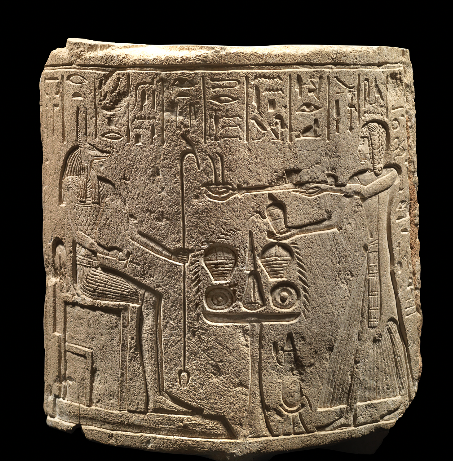 Egyptian limestone column relief of Nefer-renpet and Anubis
New Kingdom, 19th Dynasty, Ramesside Period circa 1295-1070  BC
Height: 34.5 cm
Charles Kelekian (1900-1982), USA; Collection of Jack Josephson, USA, acquired prior to 1979  Property of a Pr