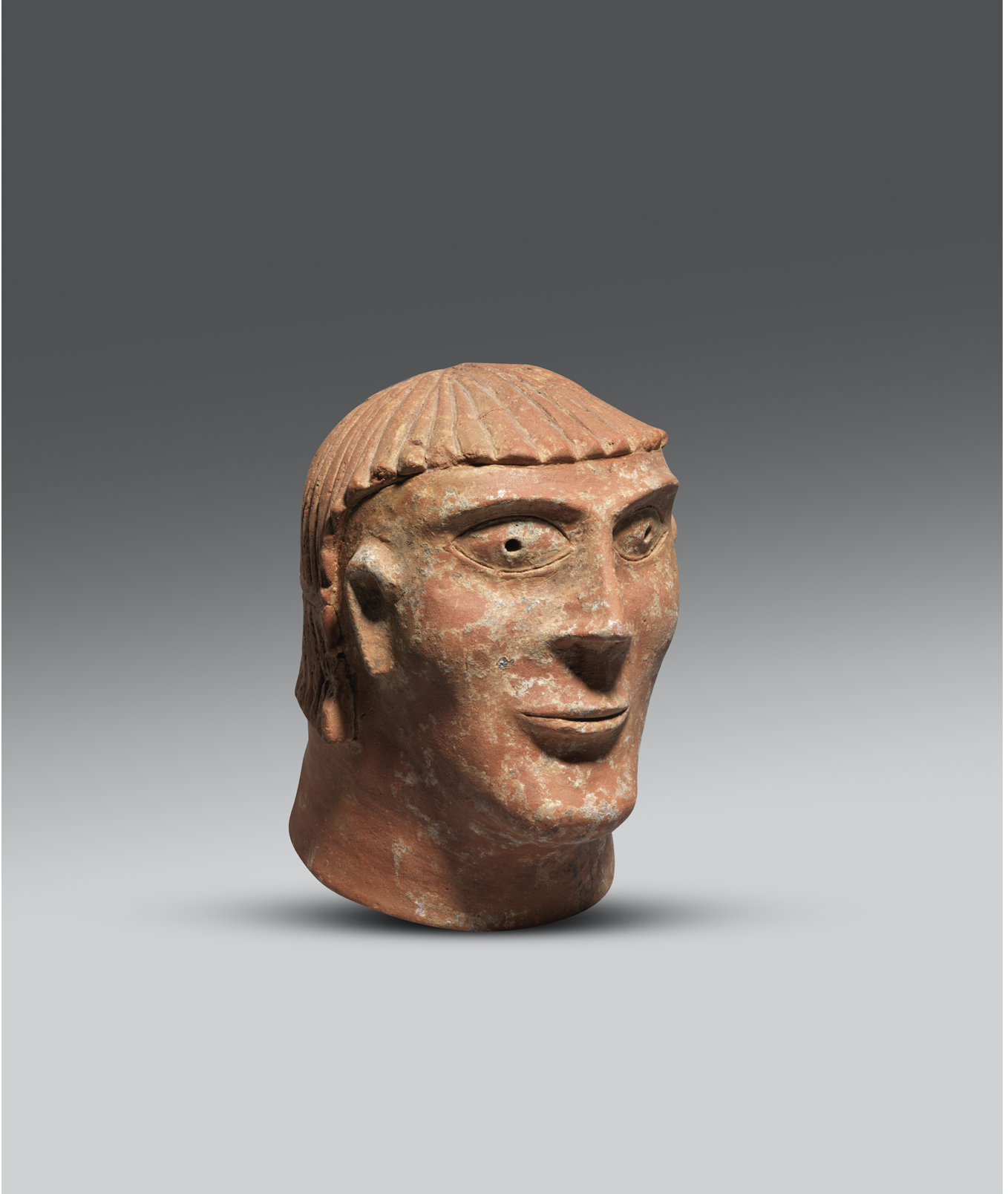 Etruscan pottery canopic urn lid, Late 7th-early 6th century BC, Height: 19 cm
