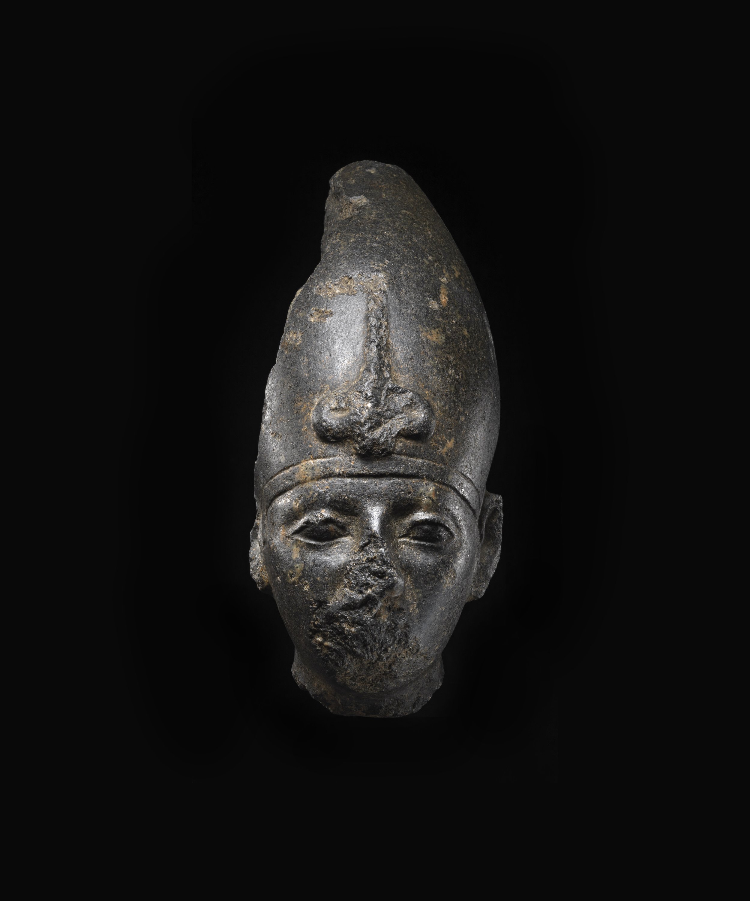 Egyptian basalt head of a Pharaoh
Middle Kingdom, c. 12th-13th Dynasty, 1850 -1650 BC
Height: 25.5 cm, Michel Abemayor collection, New York (1912-1975)