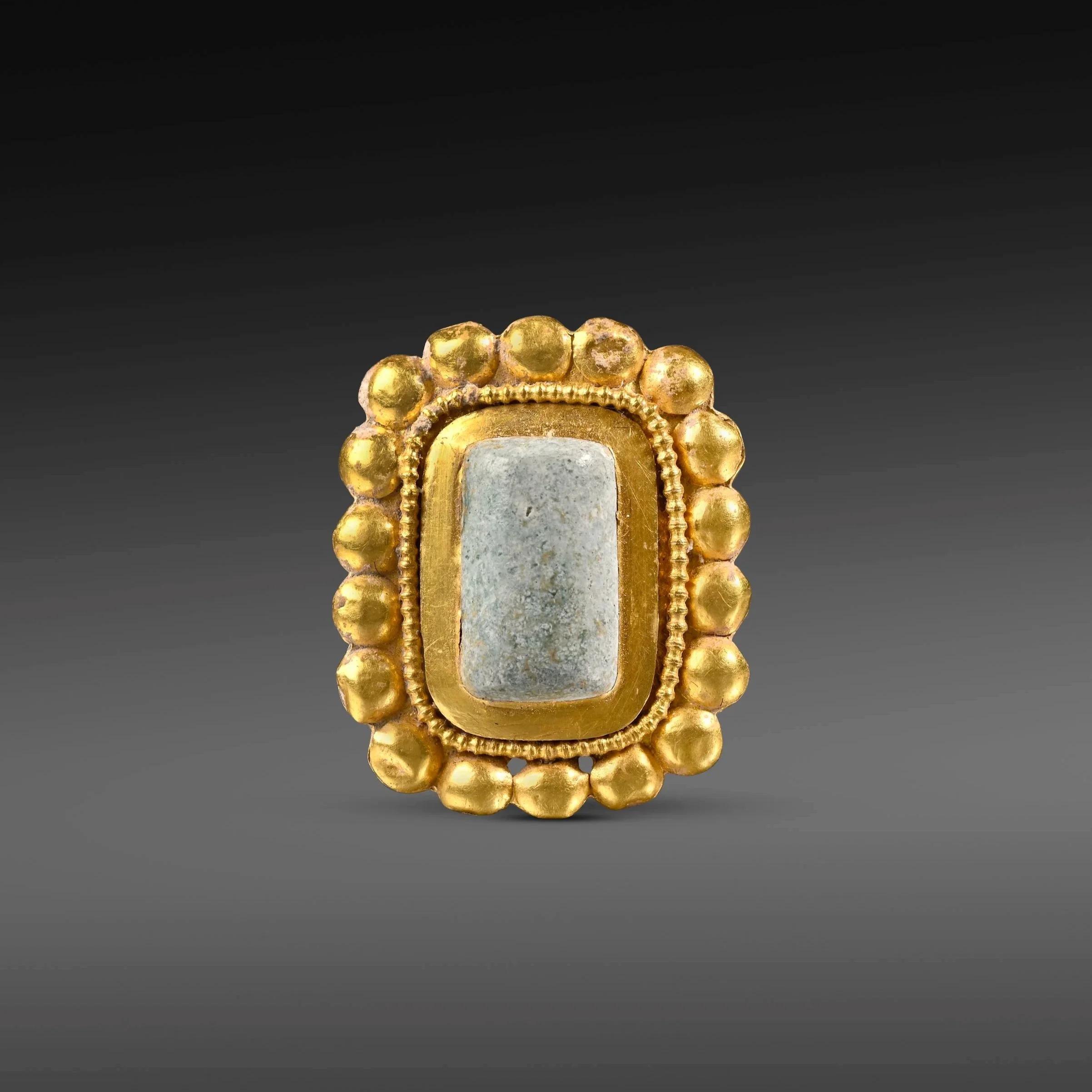 Roman gold rectangular pendant set with a fluorspar (?) stone