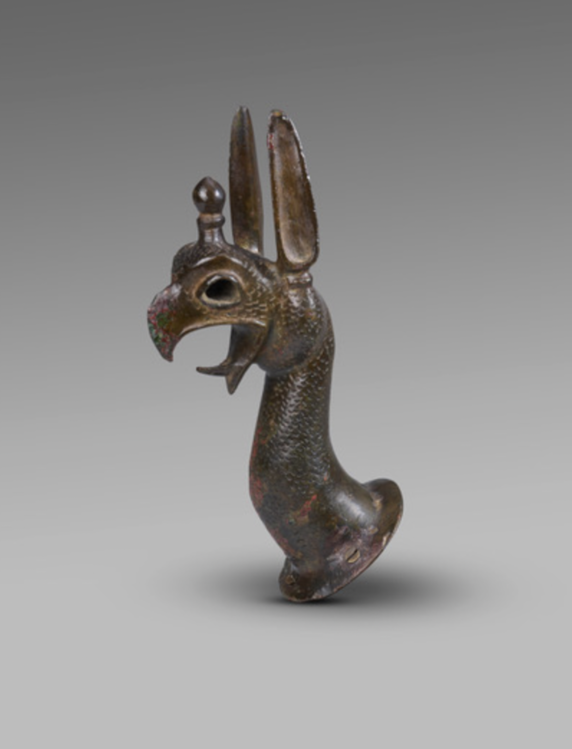 Greek protome of Griffin
7th Century BC
Height: 15 cm, 
Collection of Humphry Gilbert Garth Payne (1902-1936) and thence to his widow, Dilys Powell;  Sotheby's London, 26 November 1968, lot 160; collection of  Nourhan Manoukian (1906-1993) and thence