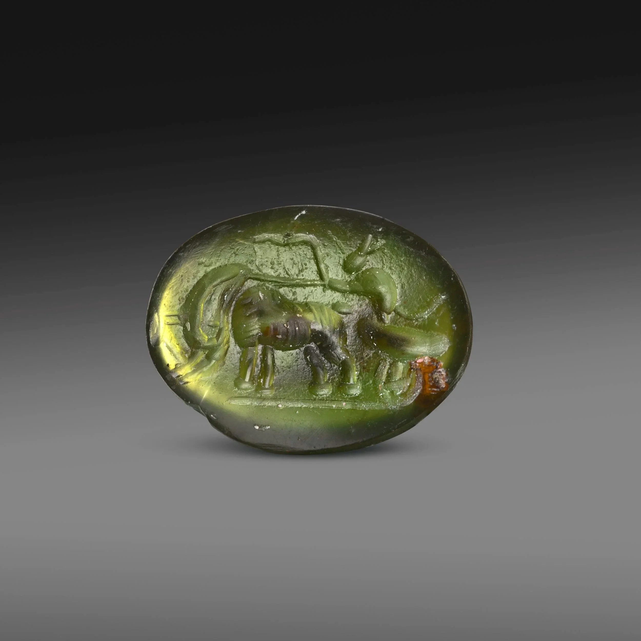 Roman intaglio depicting a mouse and elephant