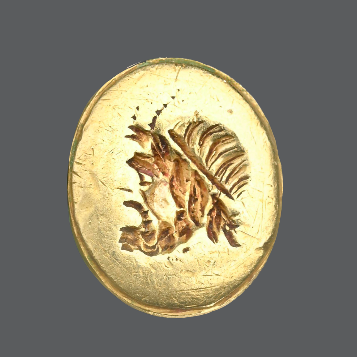 Gold satyr portrait mask intaglio