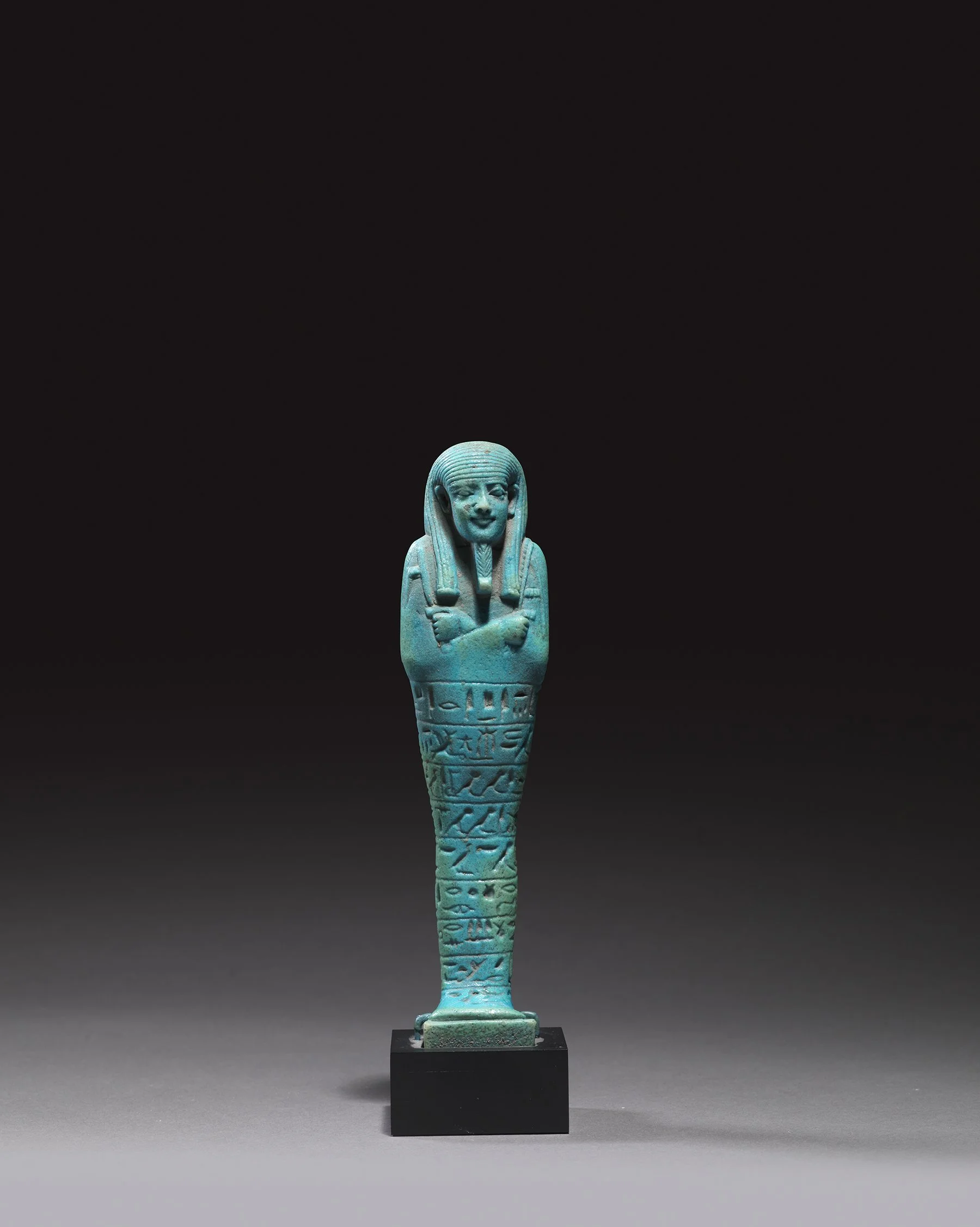 Faience ushabti of Psamtik
Late Period, 26th Dynasty, Reign of Amasis, 570-526 BC 
Height: 18.1 cm
Private collection, Switzerland, acquired 1940s