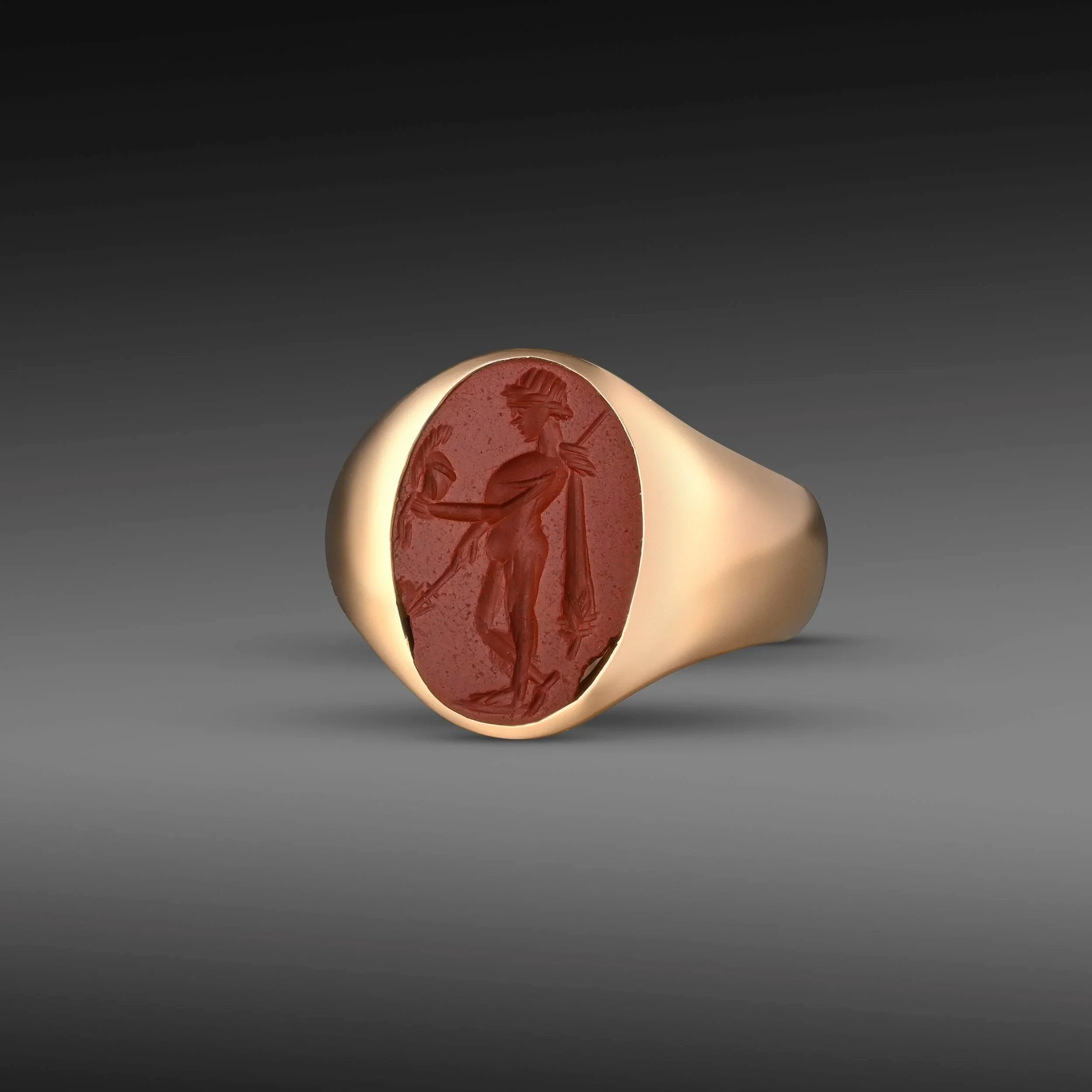 Roman carnelian intaglio of a warrior, set in gold ring