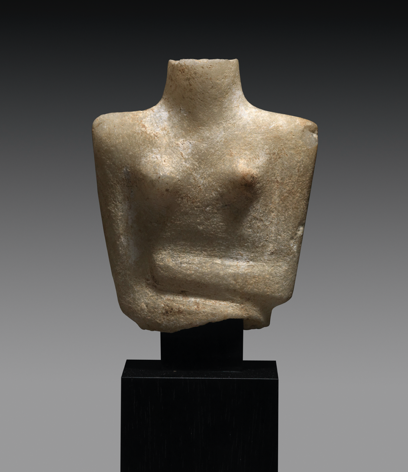 Cycladic torso from a female idol, Early Cycladic II, circa 2600-2500 BC, Height: 7.2 cm