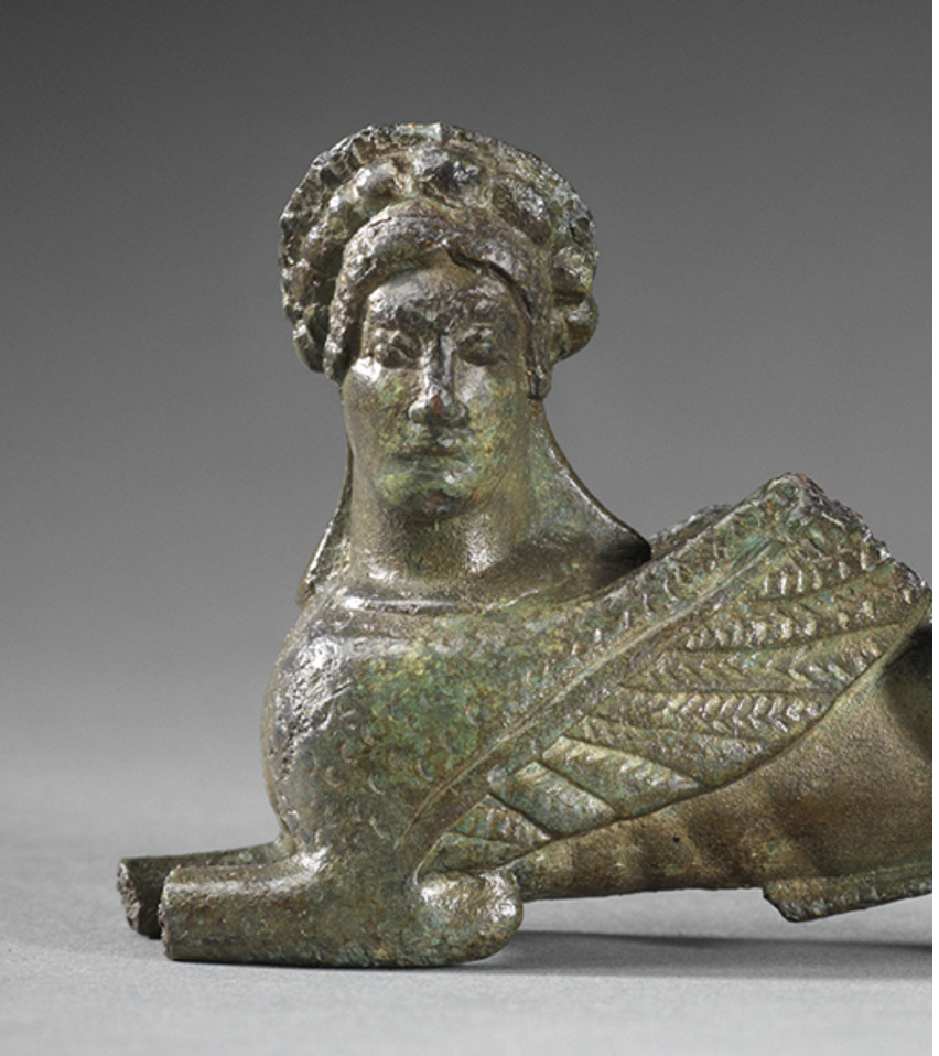 Greek bronze statuette of a recumbent sphinx
Circa 500 BC
Length: 7.5 cm, Collection of Captain E. G. Spencer-Churchill (1876-1964), acquired in March 1915; Christie's, 23 June 1965; Private collection UK (N.E.), acquired prior to 1970, and thence by