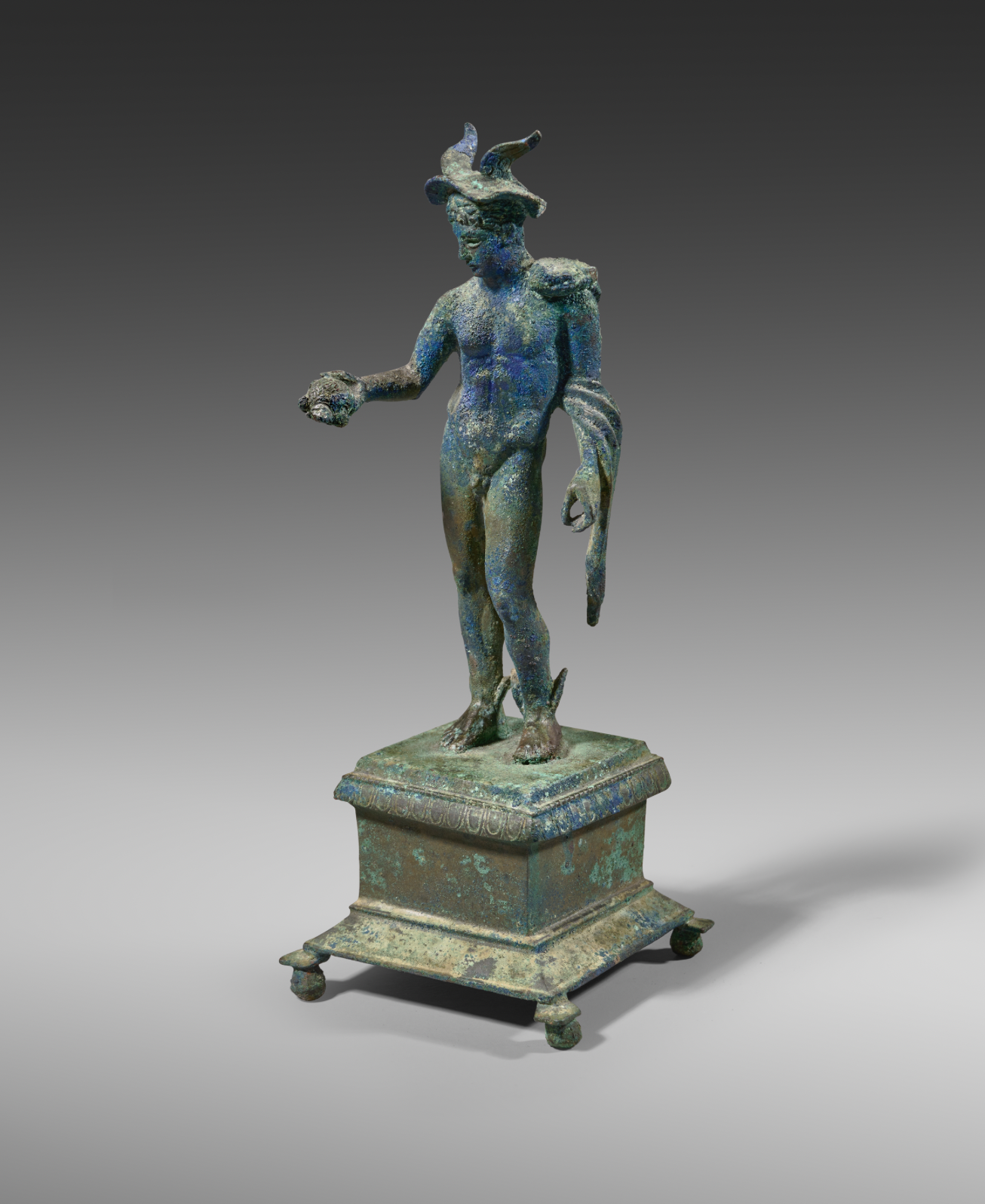 Roman bronze Mercury, holding a tortoise
circa 2nd Century AD
Height: 22.3 cm, with Nina Borowski, Paris, acquired prior to 1997
