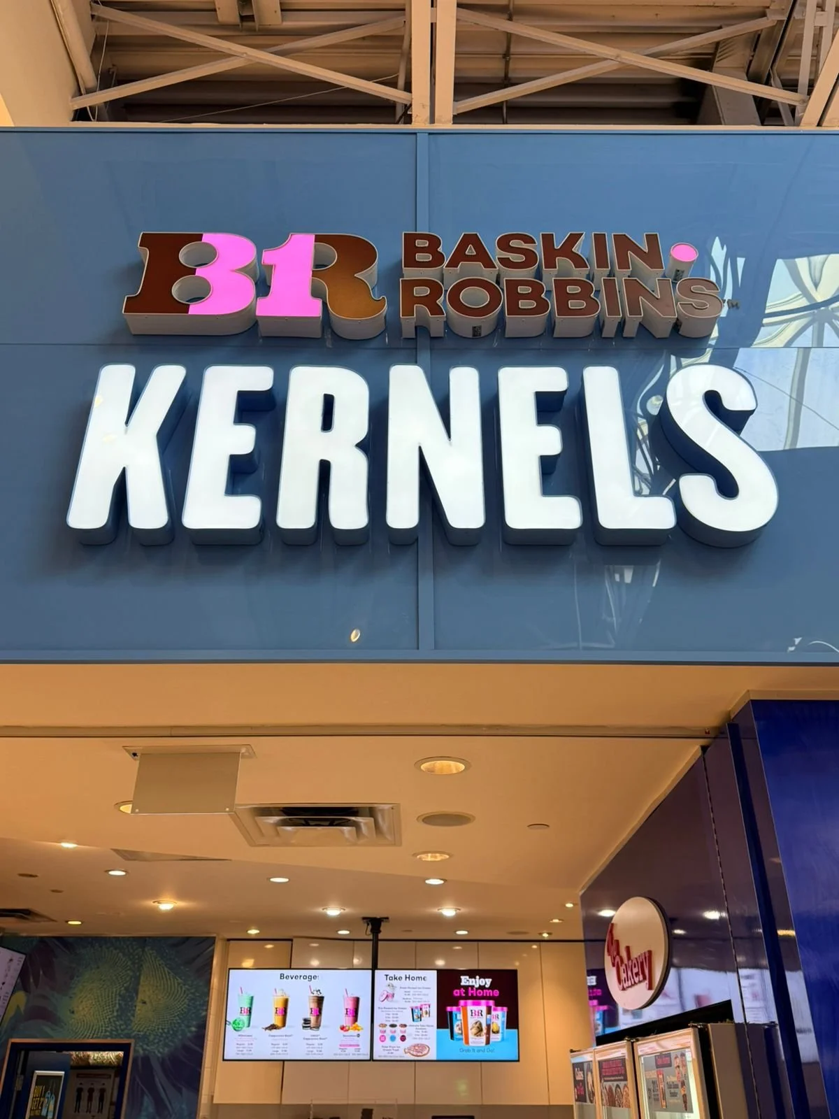 Sign for Baskin Robbins with the large word 'Kernels' below.