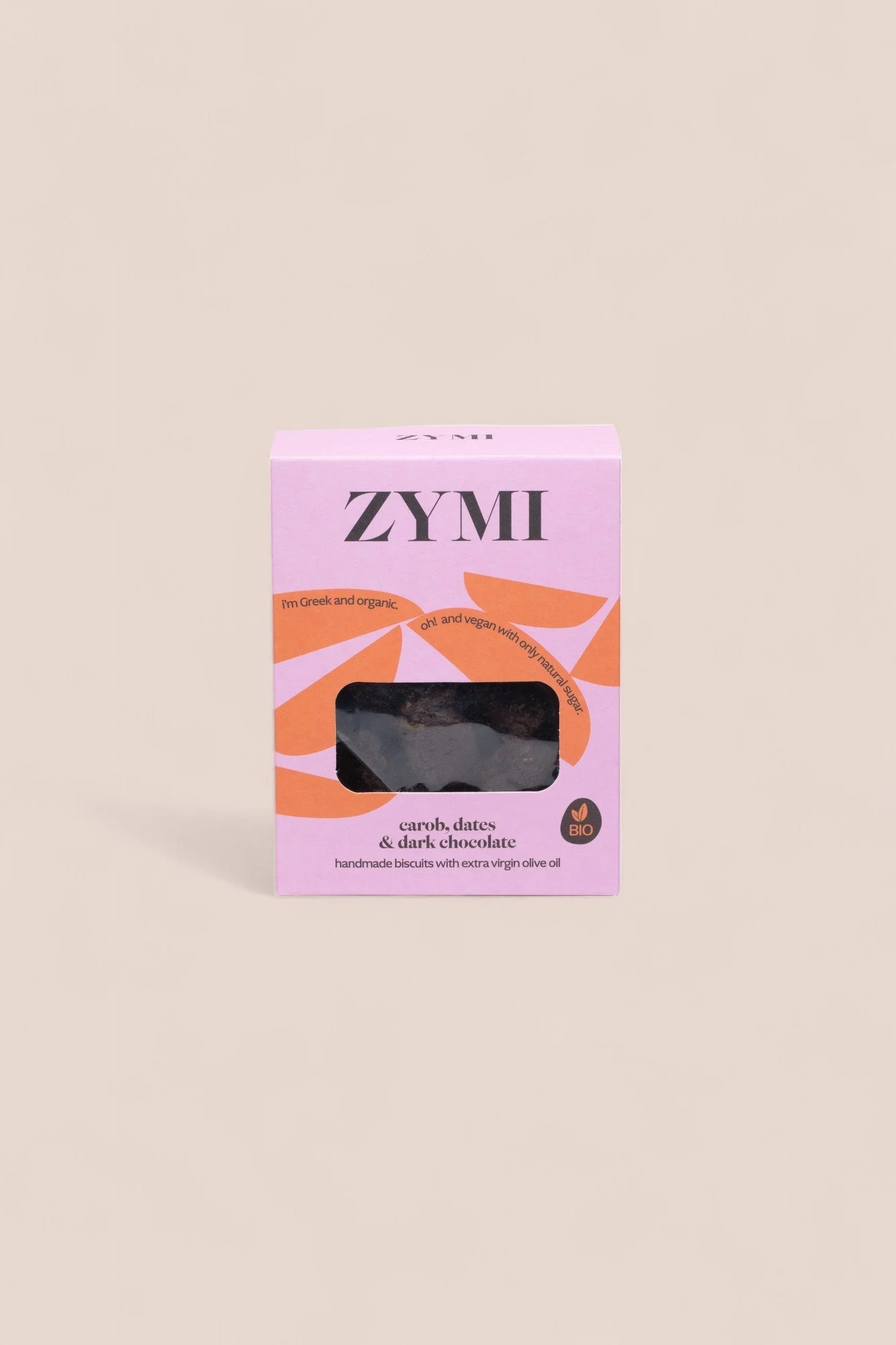 ZYMI product box in light purple with orange details, showing carob, dark chocolate & dates biscuits through a window cutout.
