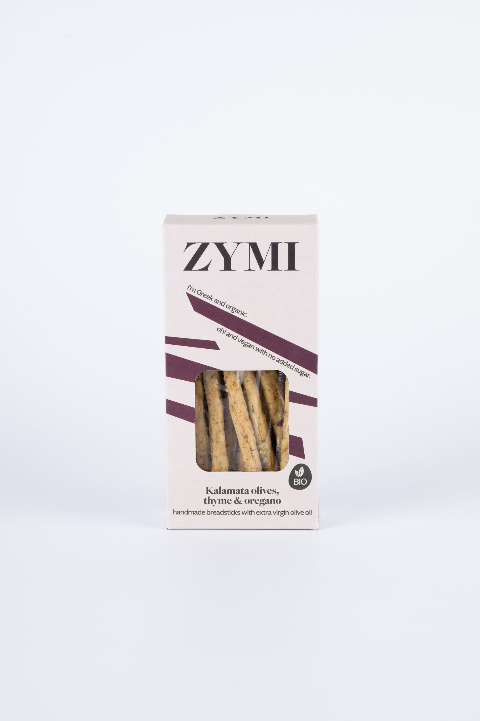 ZYMI product box in light colour with purple lines, showing kalamata olives, thyme & oregano breadsticks through a window cutout.