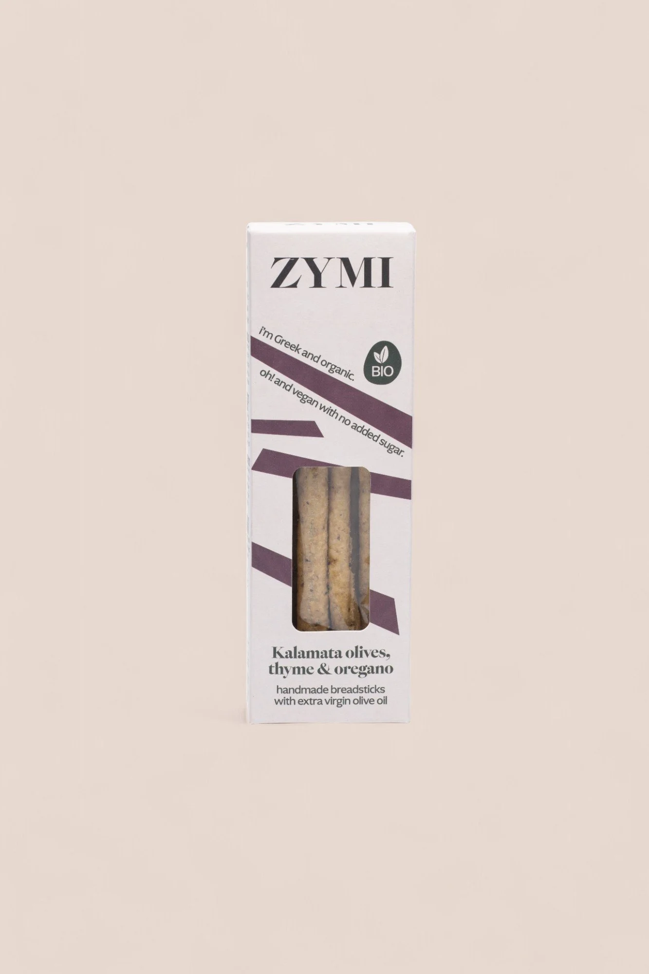 ZYMI product box in light colour with purple lines, showing kalamata olives, thyme & oregano breadsticks through a window cutout.