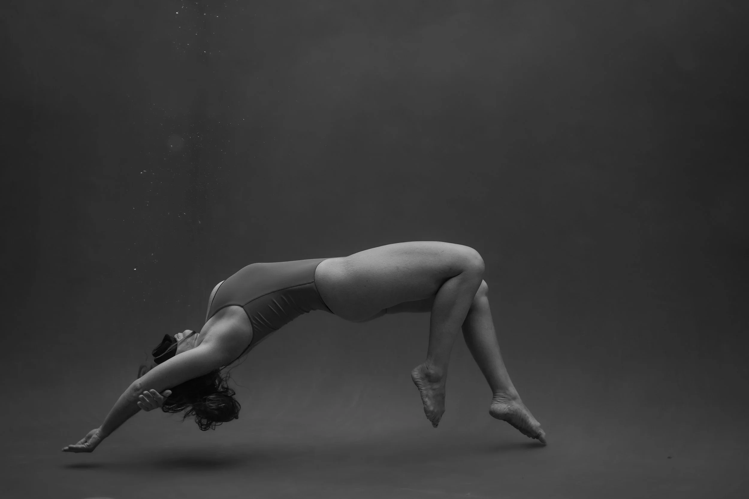 Fine art underwater photography — capturing reclamation and presence beneath the surface.