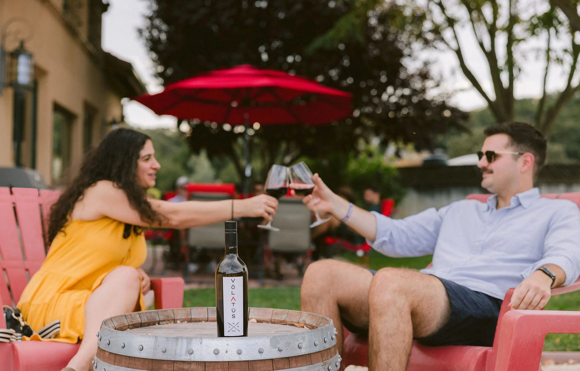 Couple toasting outside