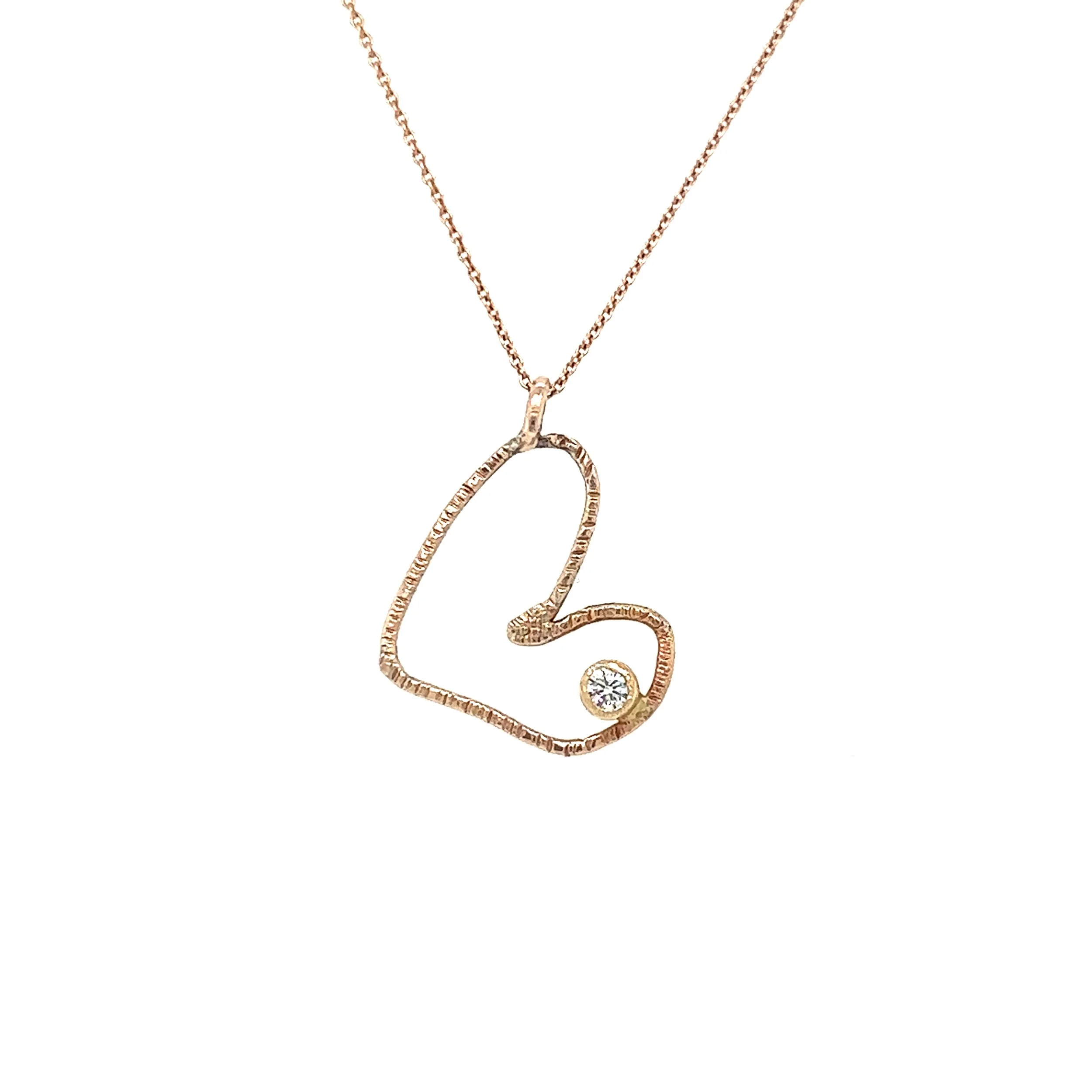 Diamond and Hammered Rose Gold Heart Necklace.jpg