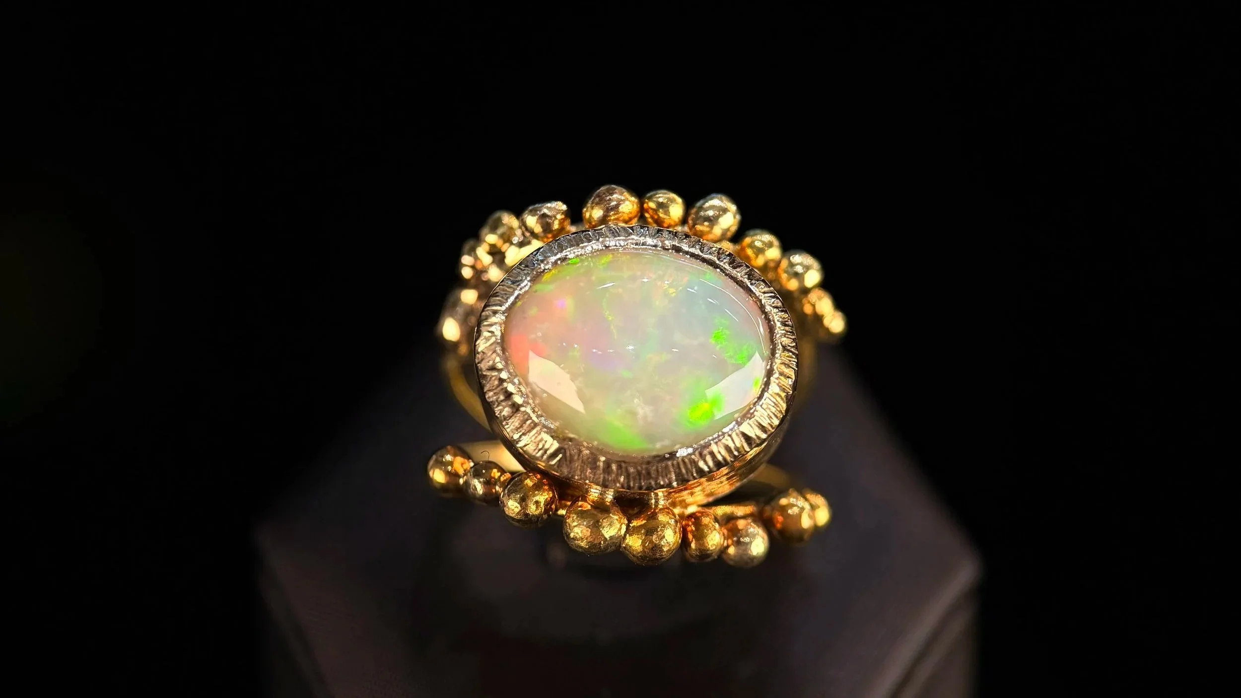 The Captivating Fire of October’s Opal