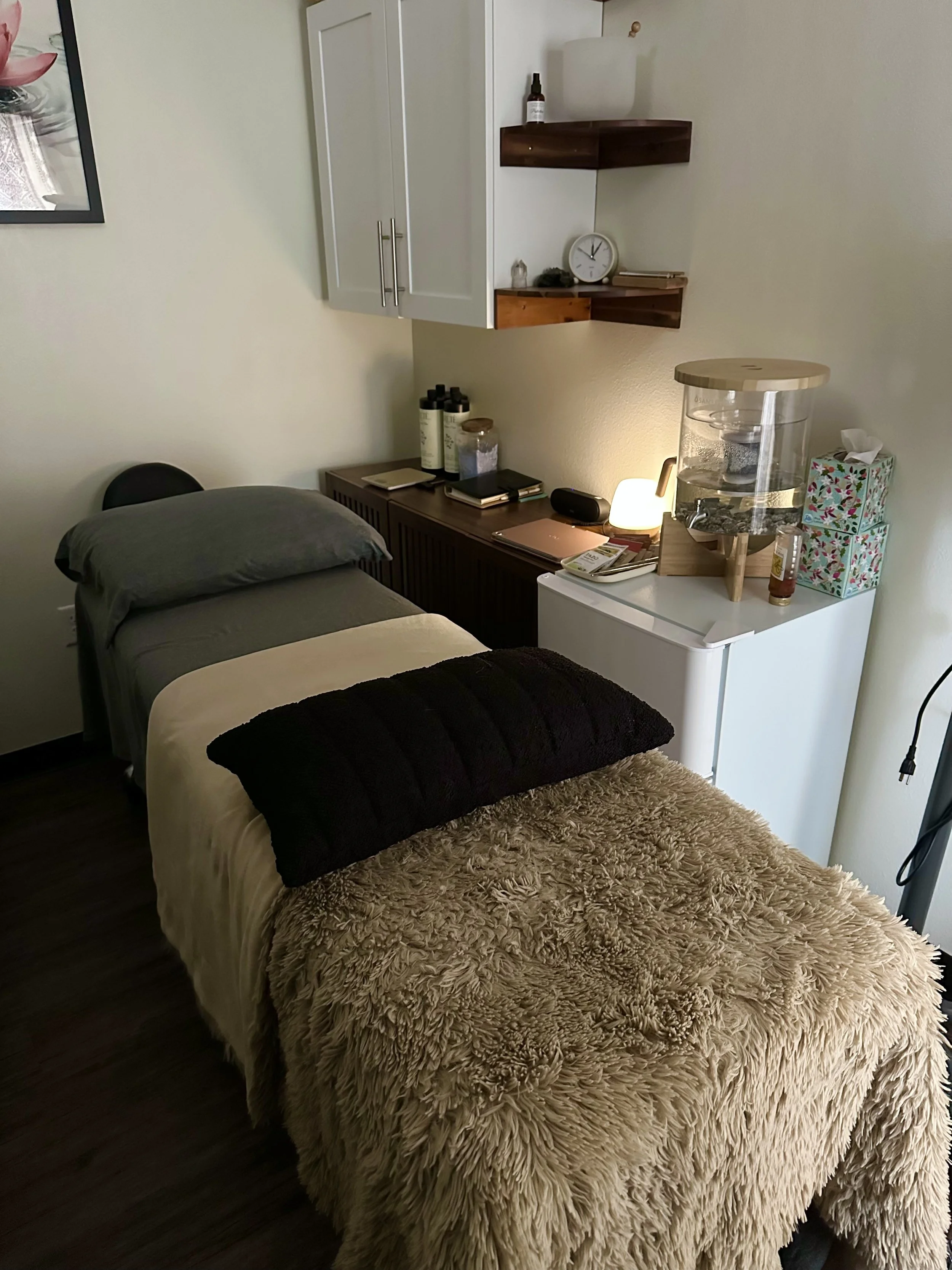 Peaceful massage table setup prepared for Craniosacral Therapy and Myofascial Release sessions—designed to support deep relaxation, nervous system regulation, and holistic healing.