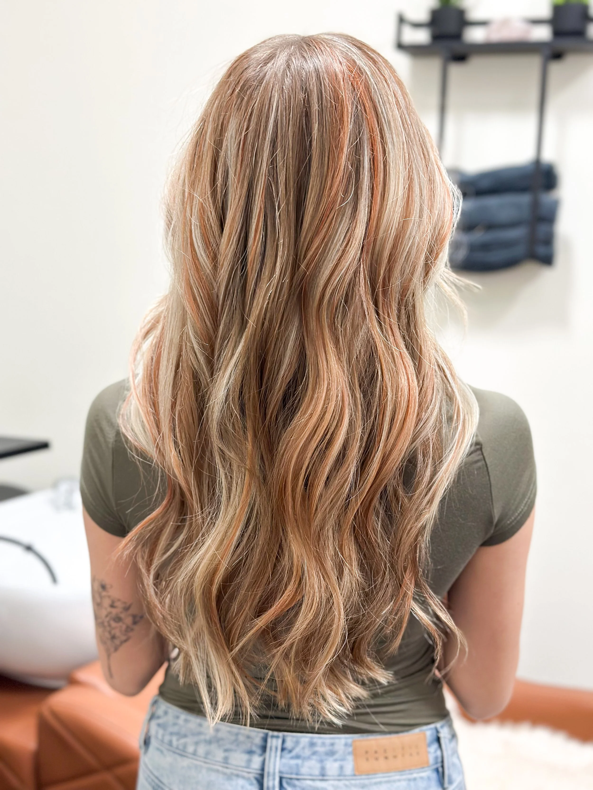 Dimensional golden blonde and copper balayage with soft dimension, created by holistic hairstylist Kristianna at Thousand Petals Holistic Beauty.