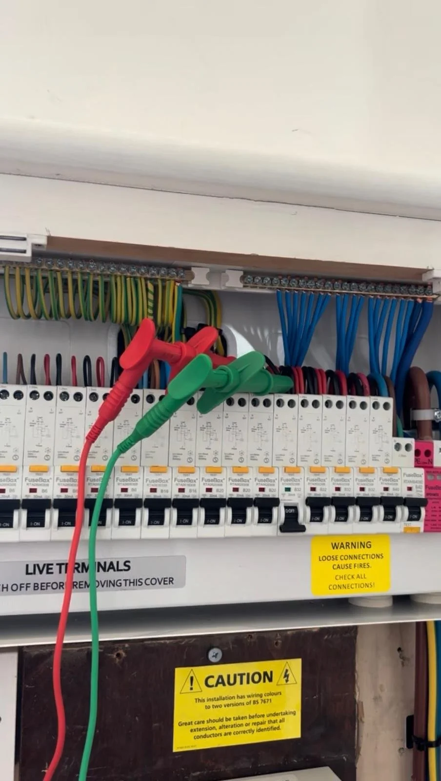 Electrician testing an electrical circuit for faults