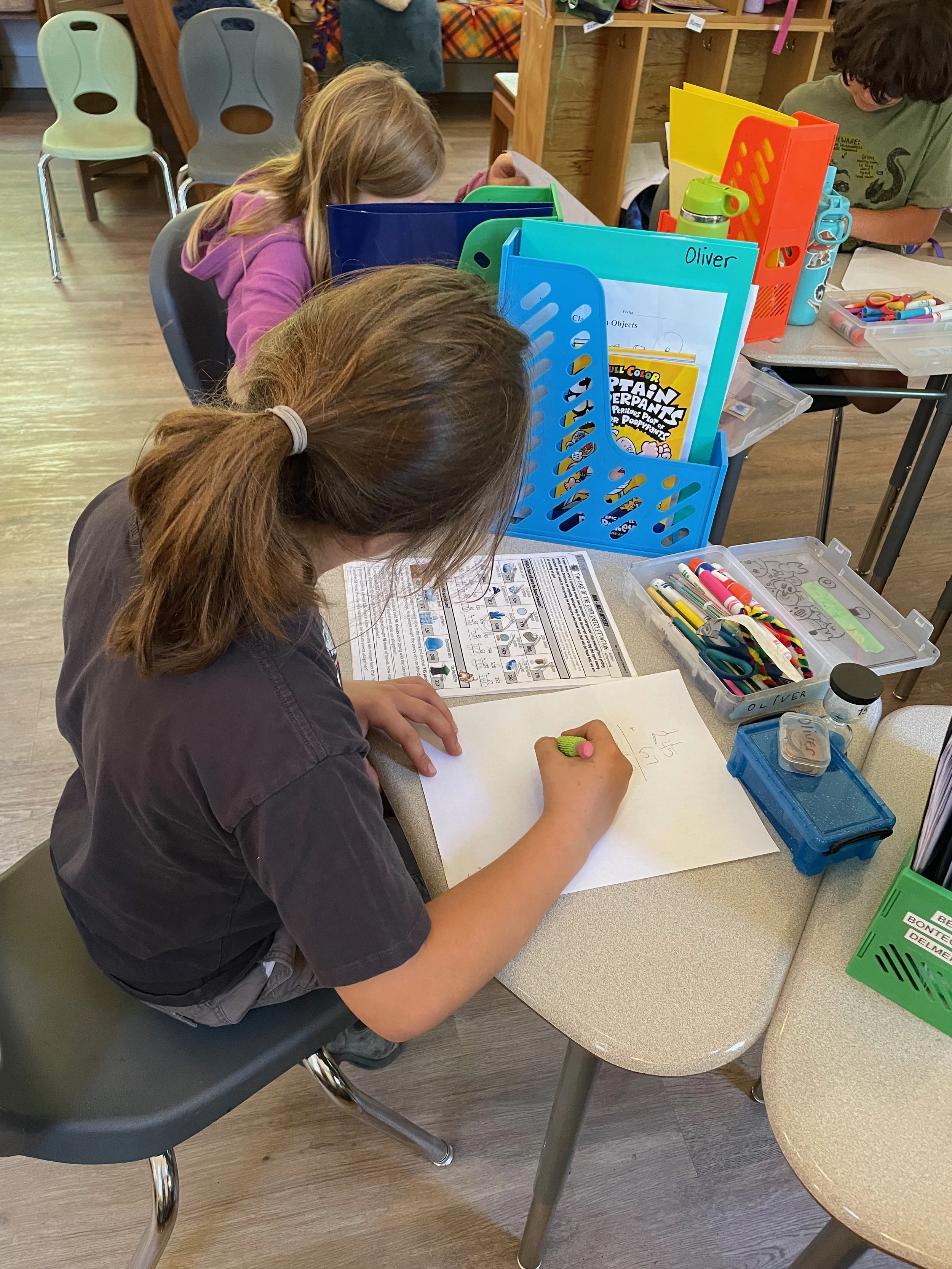 A classroom scene showing student studying.