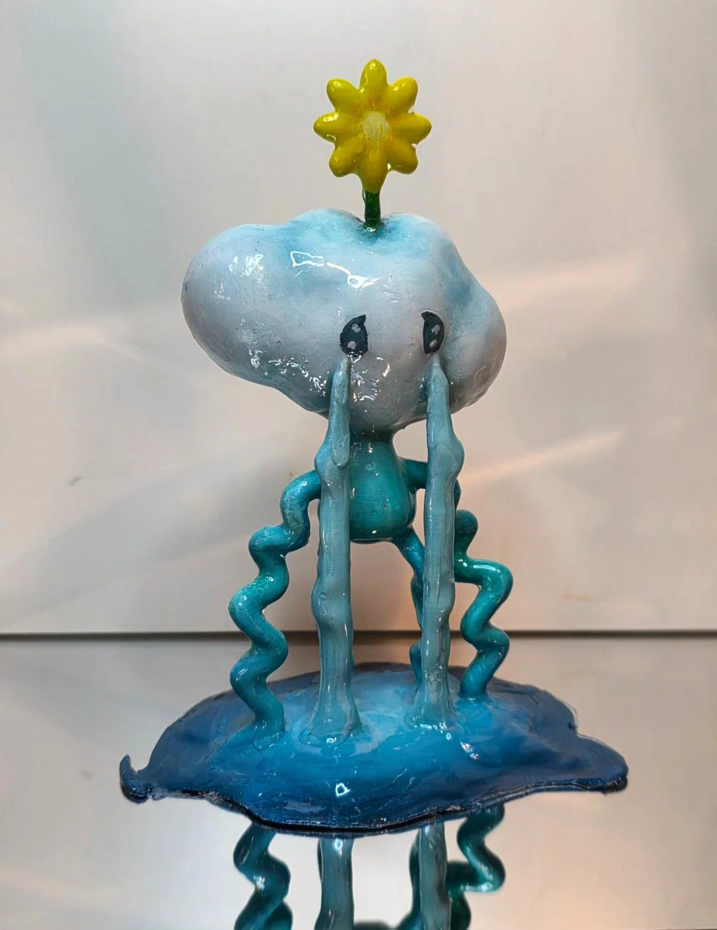 Meet Cry Baby Cloud ☁️💧
From it comes life, that&rsquo;s why there&rsquo;s a flower blooming from its head 🌼
This is the first 3D figure in a new series I&rsquo;m building around themes of nature, emotion, and soft, somber moods 🌧💭

More characte