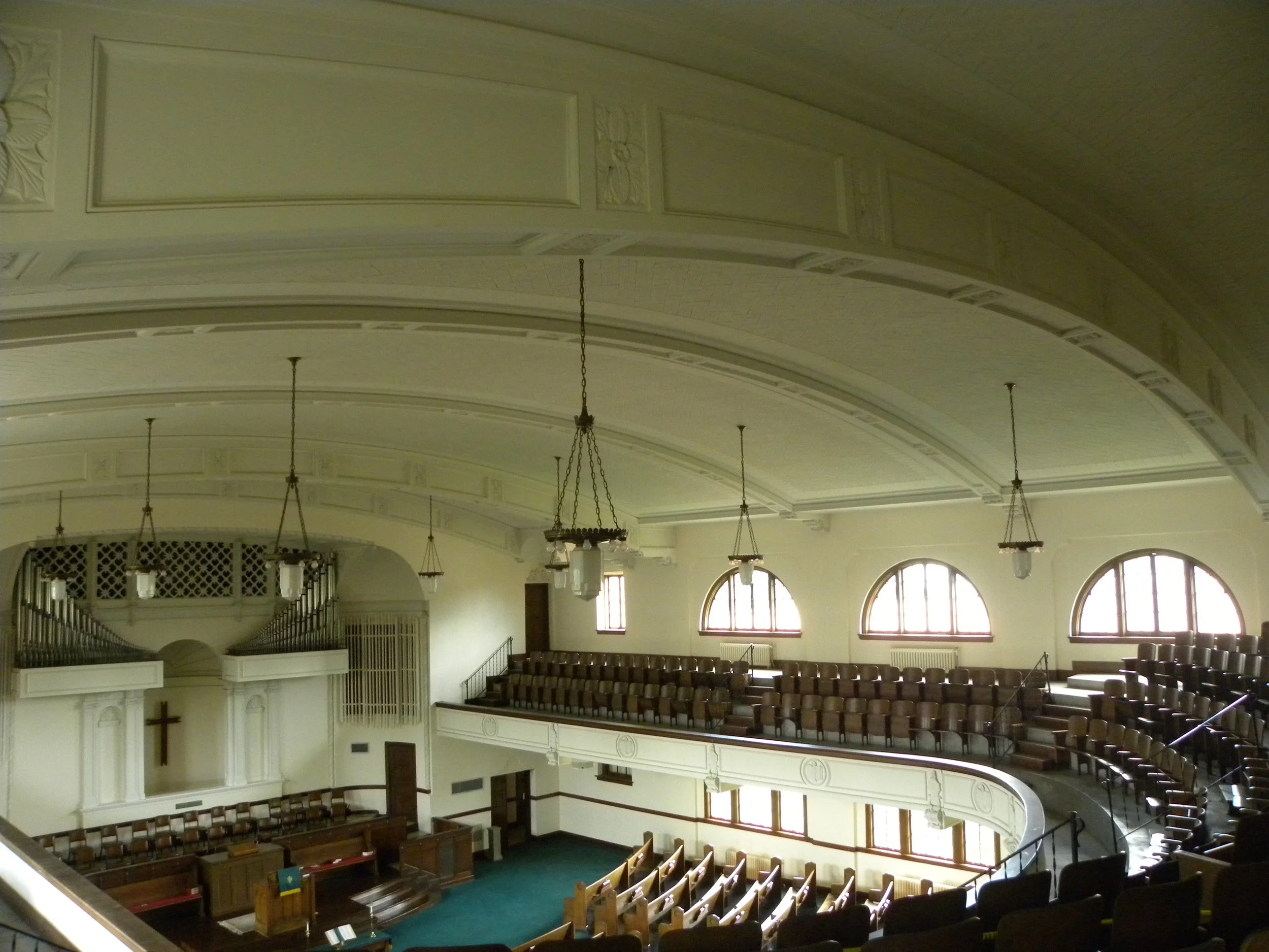 Constructed roof structure with wooden beams and terracotta tiles, in an attic or loft under renovation.