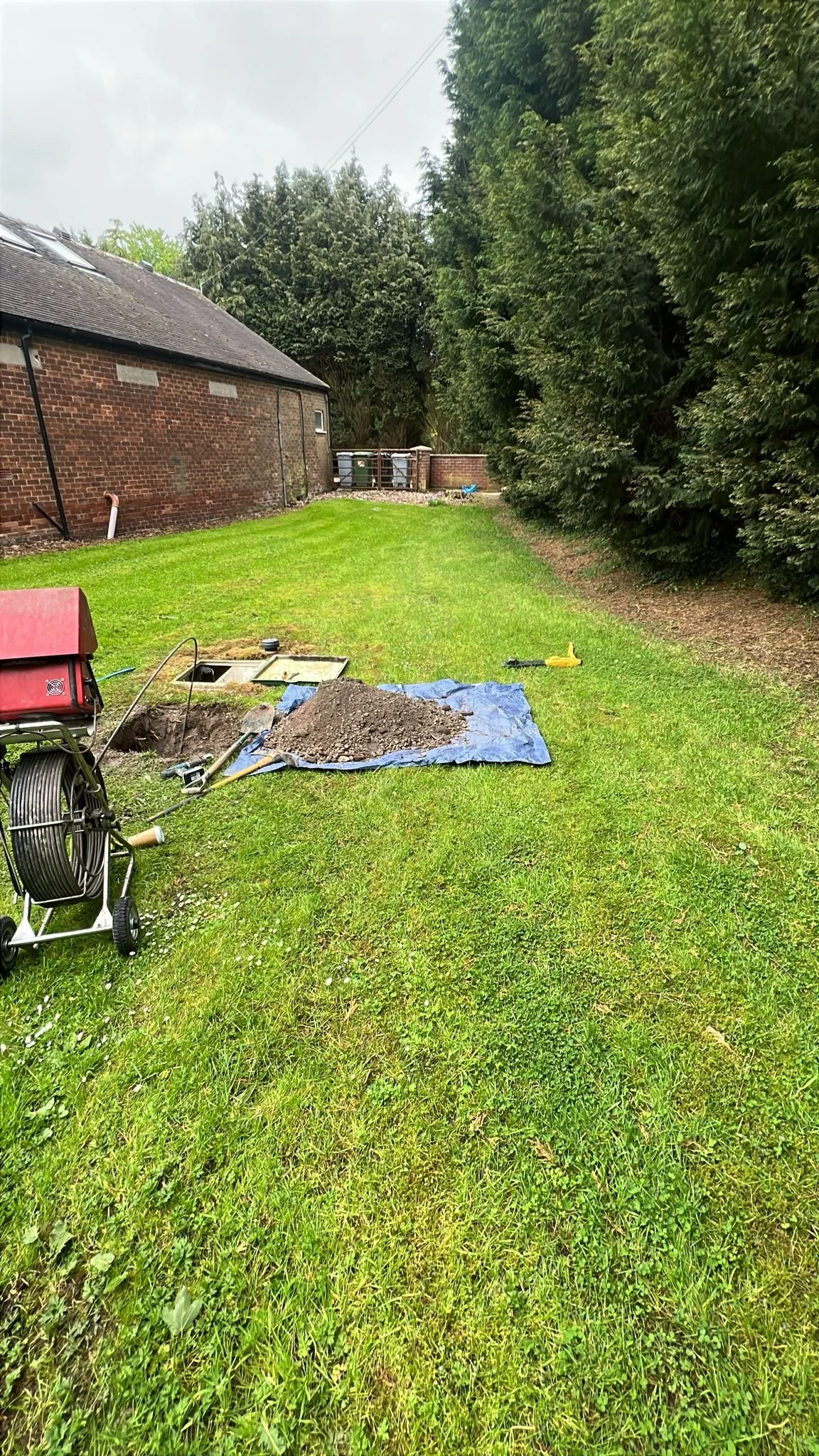 CCTV drainage survey and excavation works at a farm in Bosley, Cheshire to expose water treatment plant outlet pipework during a private drainage inspection.