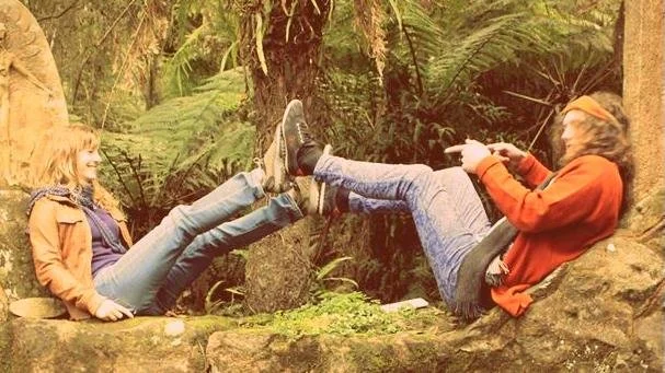 Cale Anderson presses his feet against Olivia's in The Dandenong Ranges, outside of Melbourne