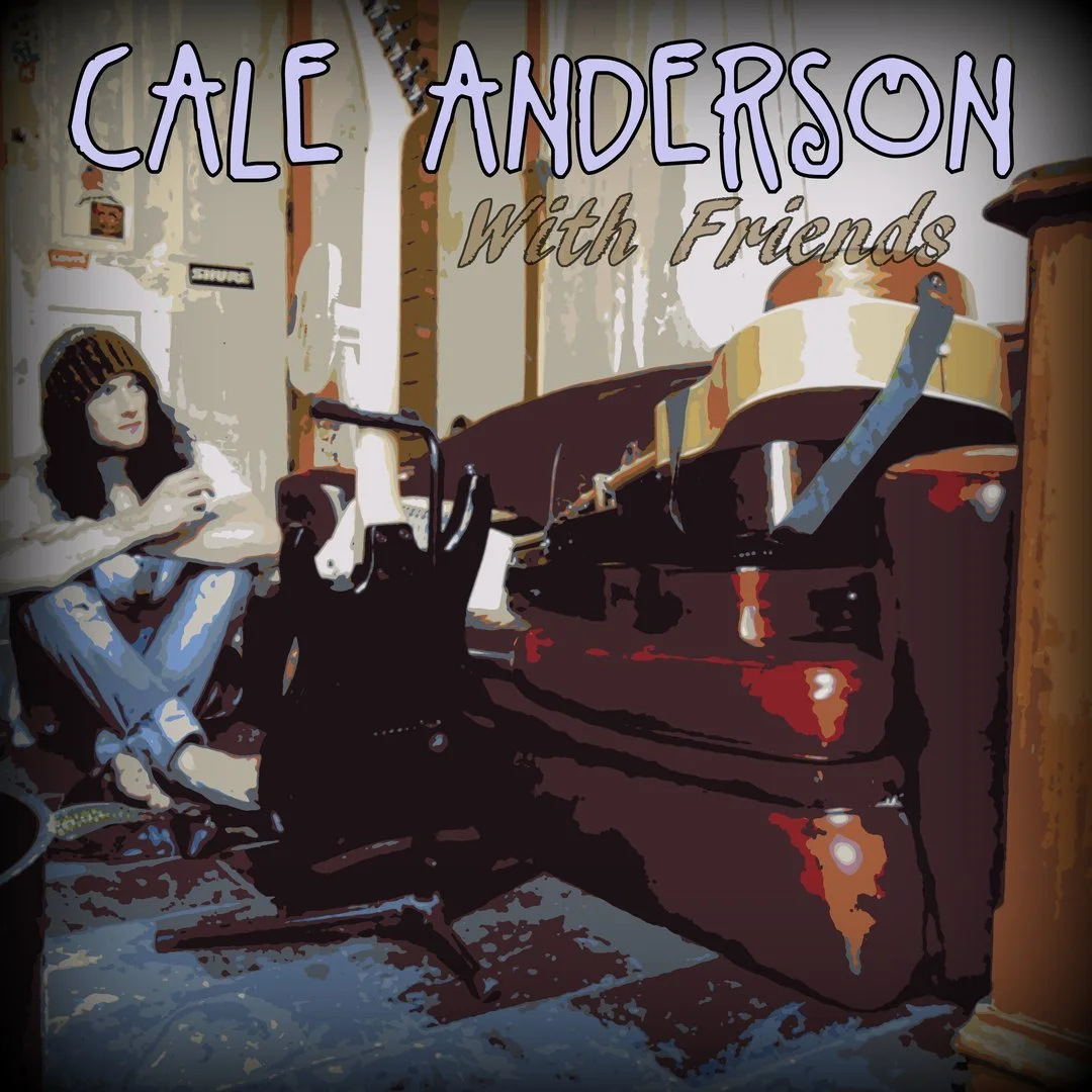 The album cover shows a woman with dark hair, wearing a brown beanie, sitting cross-legged on the floor next to a grand piano. The background features a wall with some framed pictures. The album title, 'CALE ANDERSON With Friends,' is written in larg