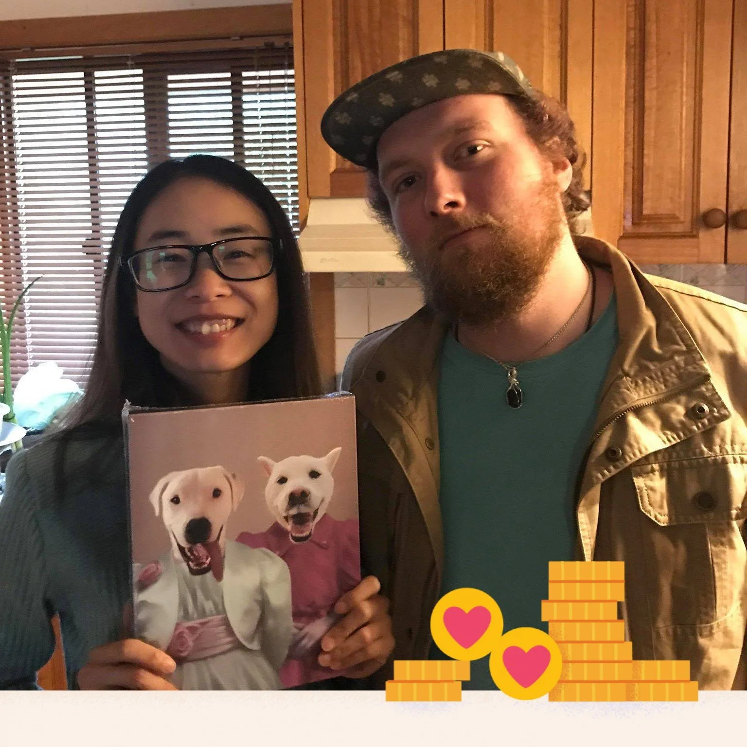 A young woman and a young man standing together in a kitchen, holding a photo of two dogs dressed in clothing, with a graphic of coins and hearts at the bottom.