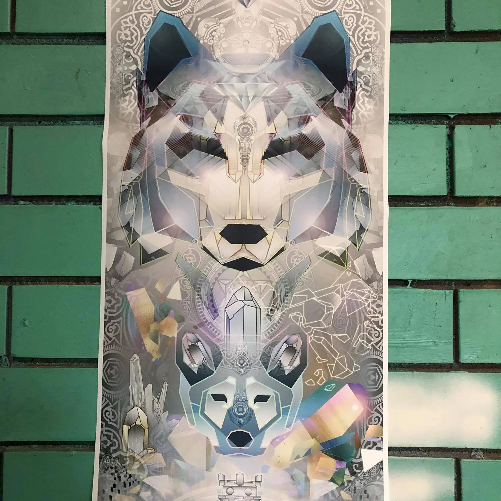Digital artwork of a stylized wolf, panda, and lion's face arranged vertically with geometric shapes and abstract patterns in a futuristic style.