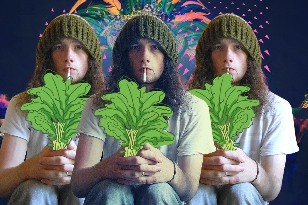 Three people sitting together, each holding a cartoon illustration of a bunch of leafy greens in front of their chest. They are wearing knit beanies and casual clothing, with a colorful, psychedelic background.