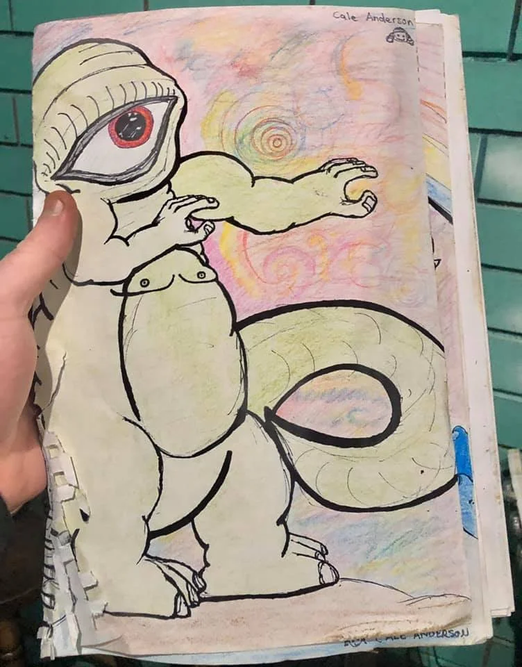 Drawing of a creature with a snake body and a humanoid torso and head with an eye, wearing a beanie hat, on a colorful, swirling background.