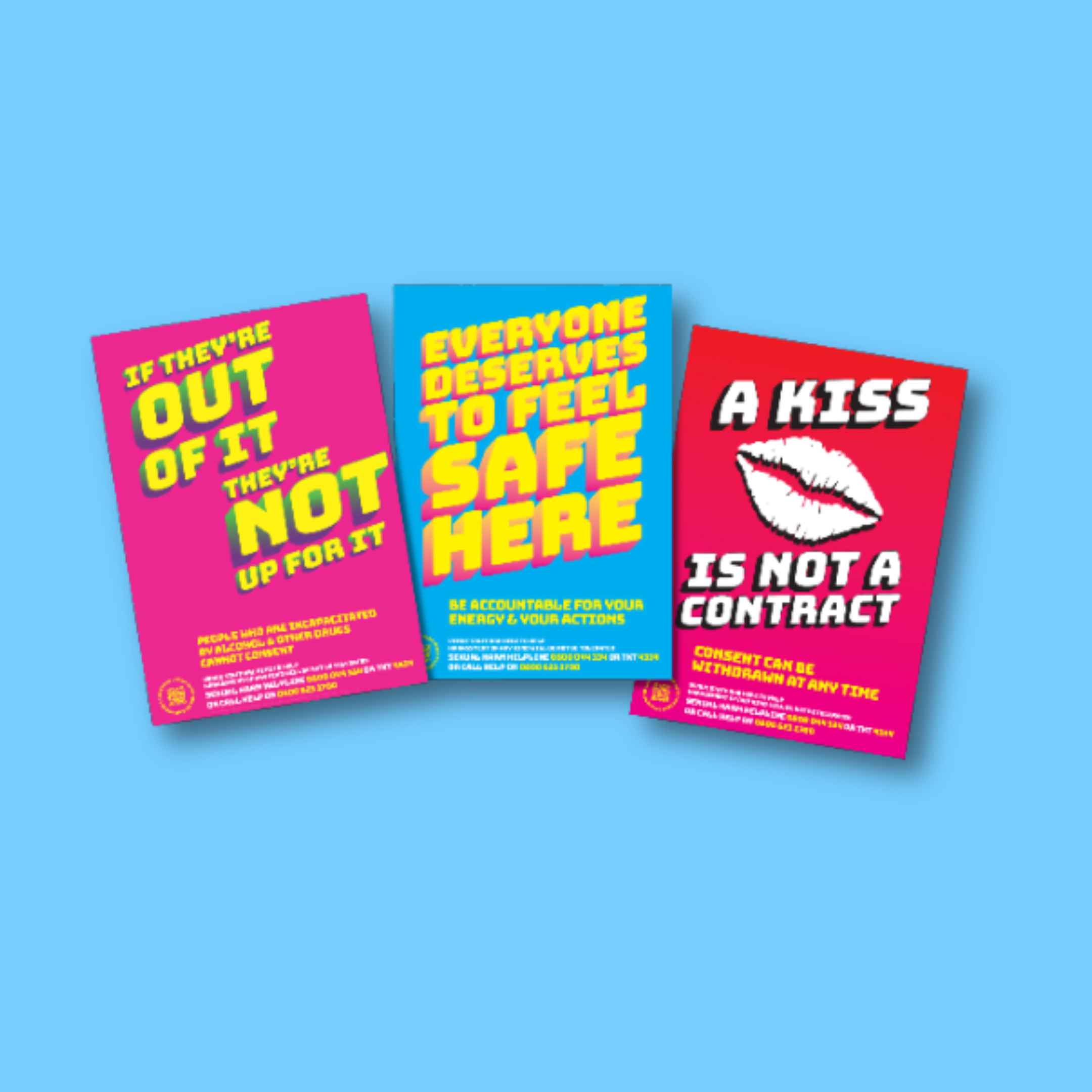 Three brightly coloured posters with prevention messages on them in large bolded text