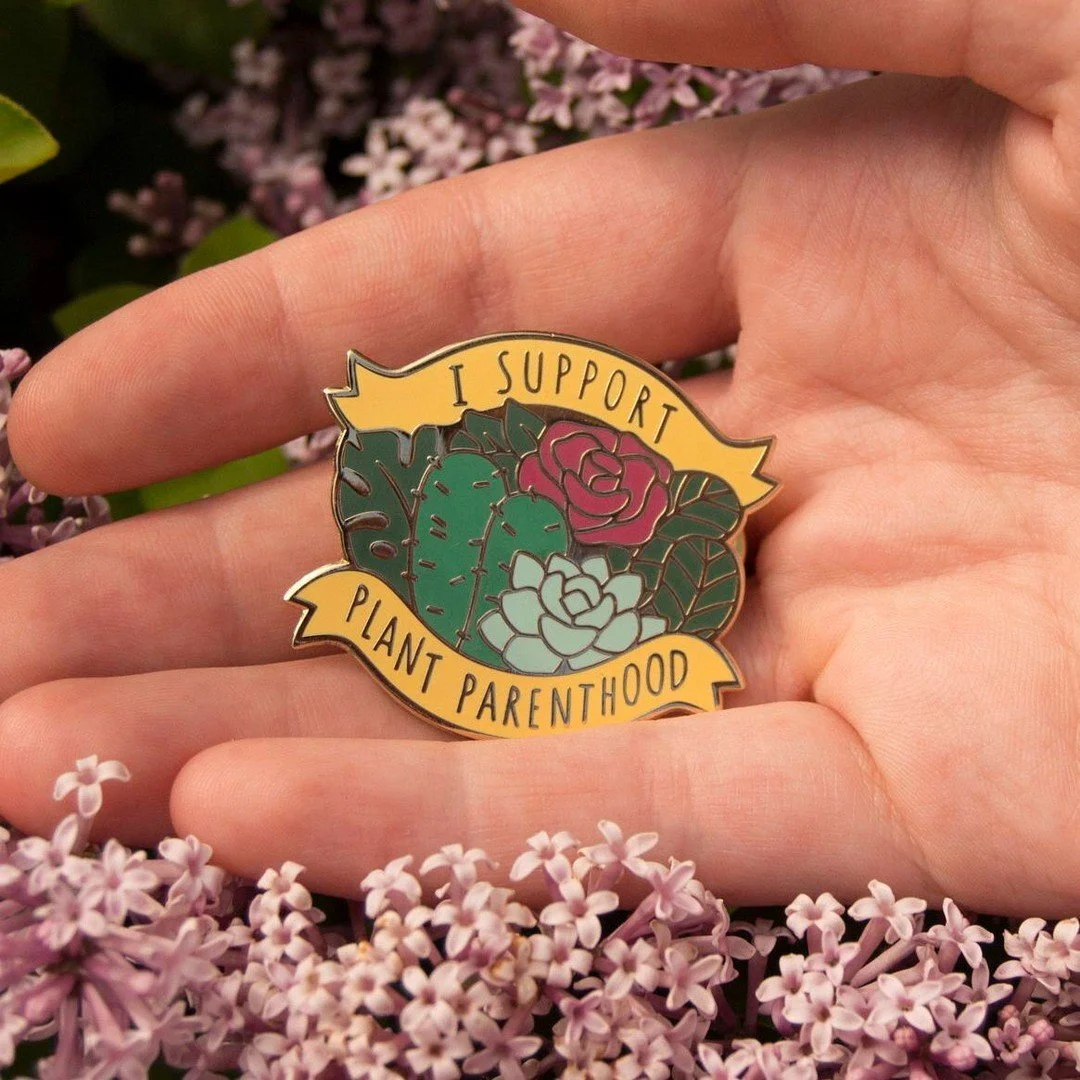 Throwback Thursday to our first ever enamel pin. I think this guy is from 2017? Featuring my youthful 2017 hand. Should we bring this guy back? 
-
We're officially on holiday break until Jan 5, so while you can't order things from our shop right now 