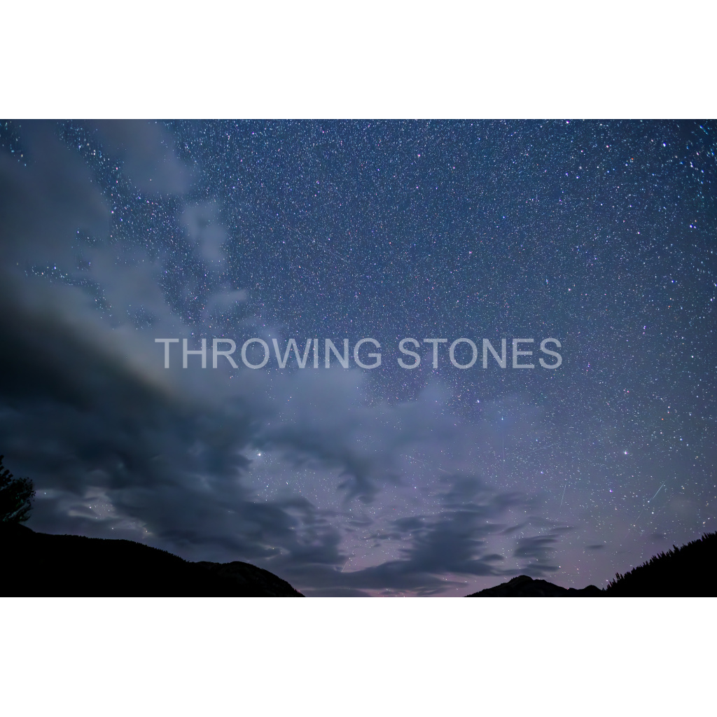 Turquoise Lake Night Sky with the Faint Auroras on the Horizon