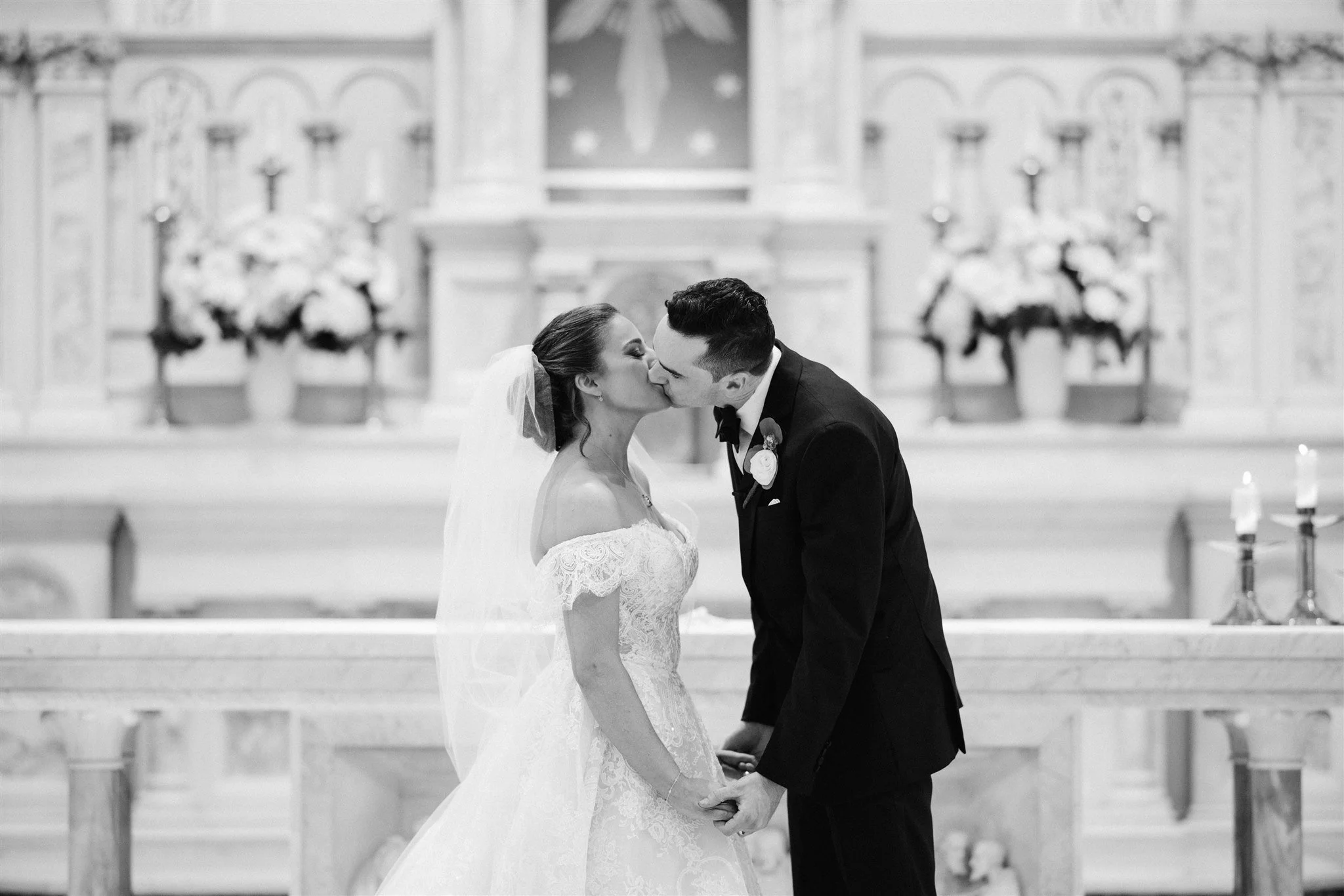 The Palace at Somerset Park-Somerset, NJ-wedding kiss at altar.jpg