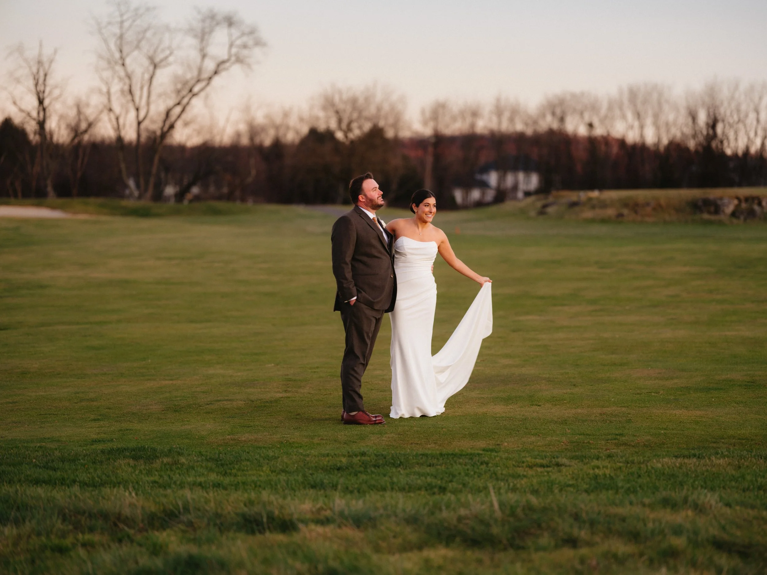 Hawk Pointe Golf Club- Washington NJ-bride and groom outdoor wedding picture on rolling green hills.jpg