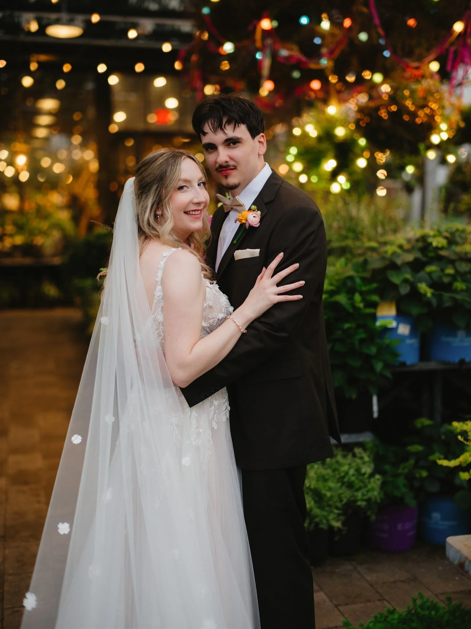 New Hope, PA- Terrain Gardens- bride and groom under lights.jpg