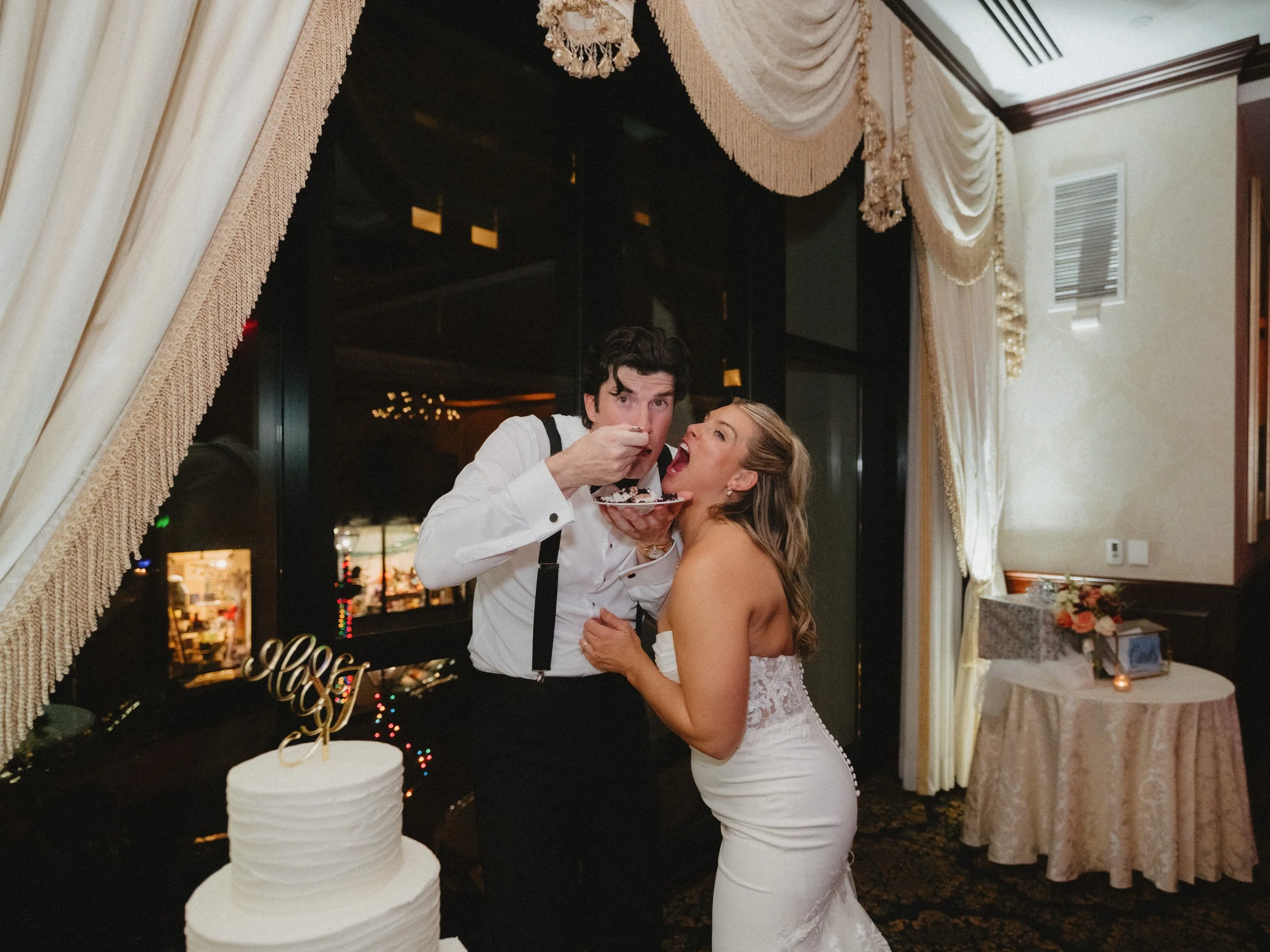NASSAU INN PRINCETON NJ Venue-bride and groom eating the cake.jpg