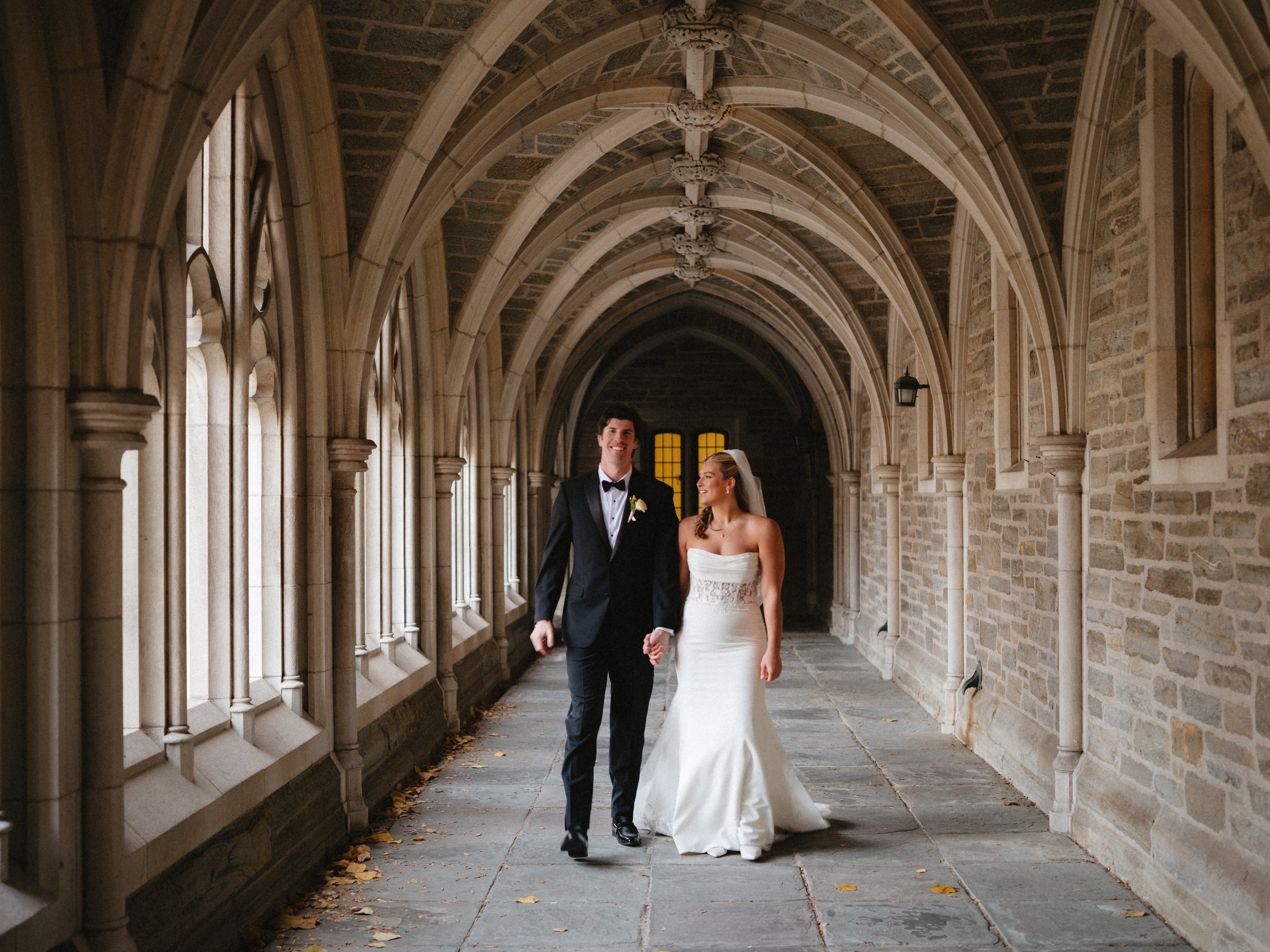 NASSAU INN PRINCETON NJ Venue- wedding couple walking in hall.jpg