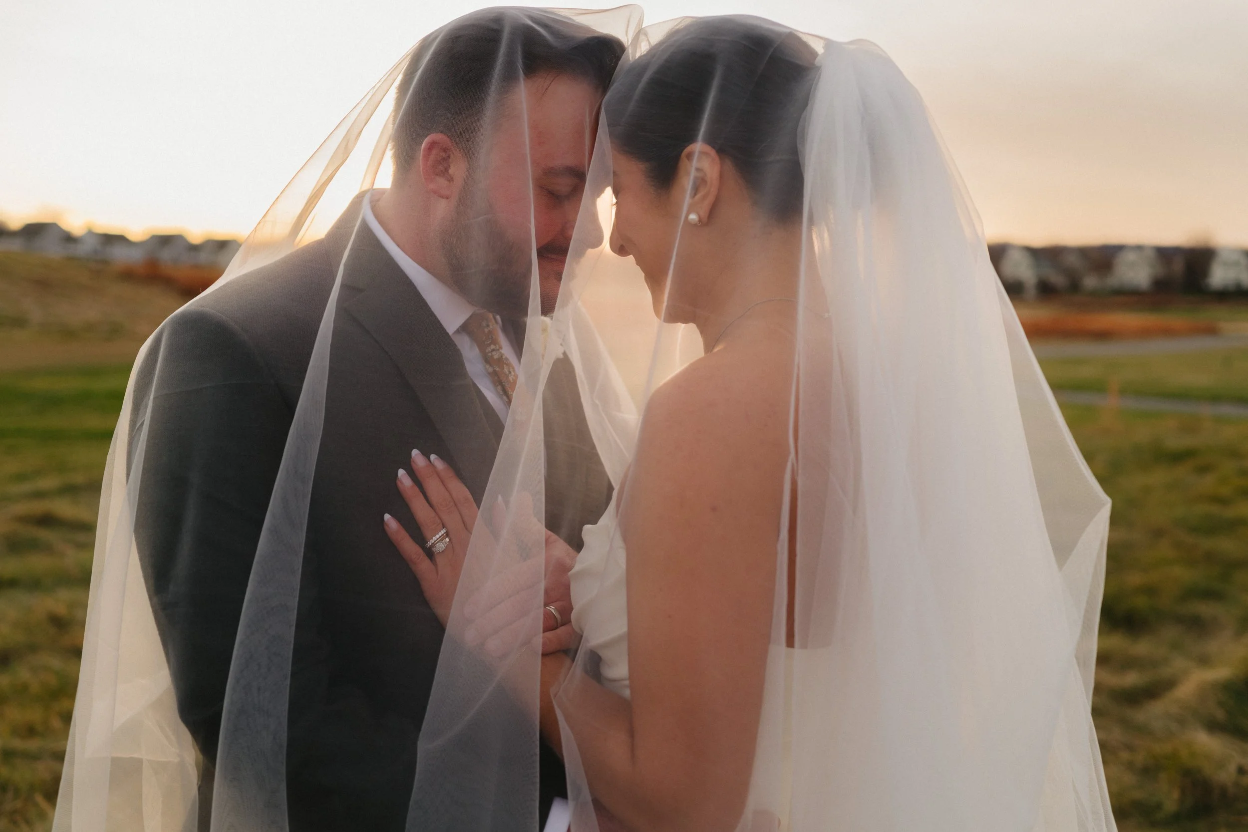 Hawk Pointe Golf Club- Washington NJ-bride in veil with groom outside.jpg