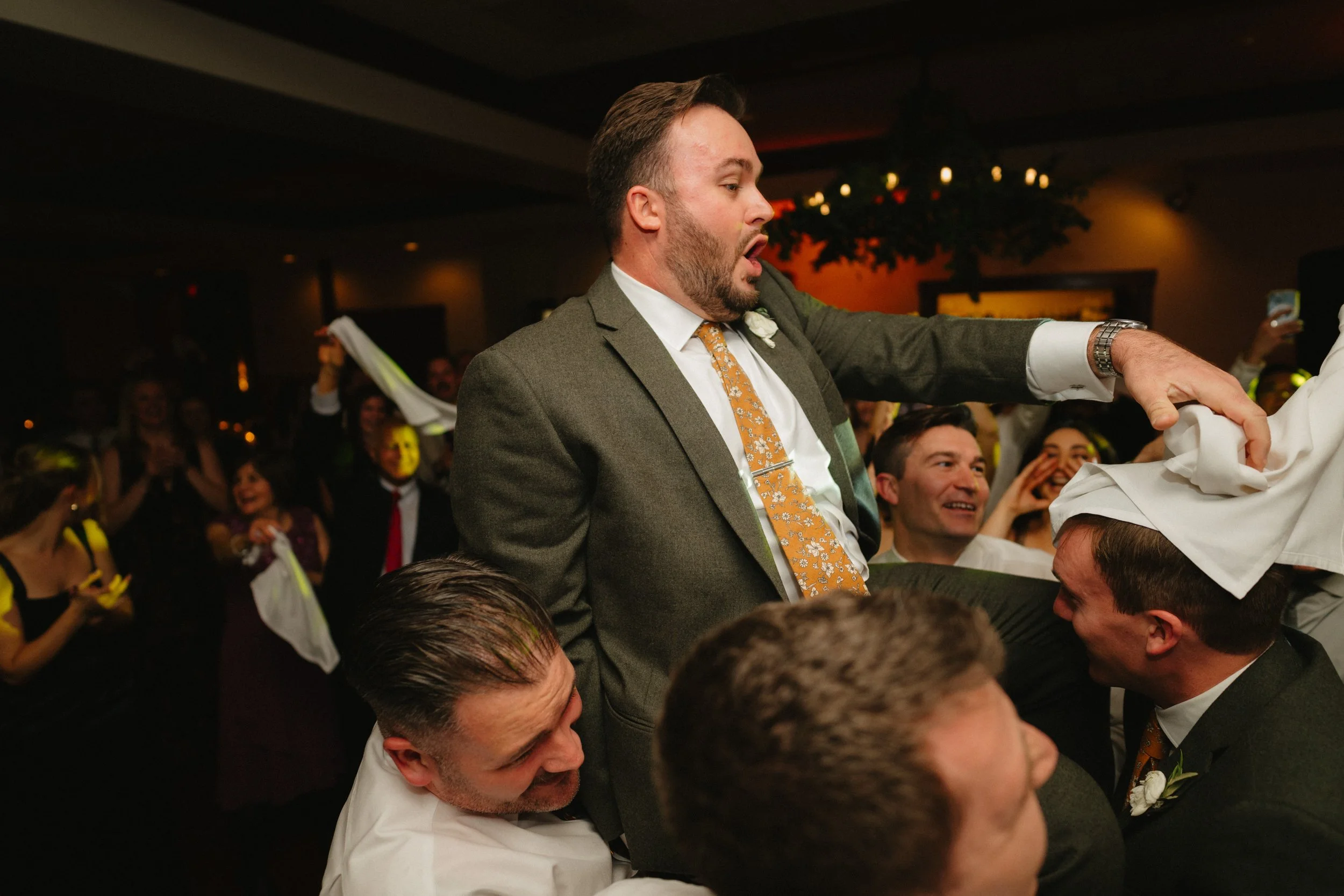 Hawk Pointe Golf Club- Washington NJ- groom dancing with best men around him.jpg