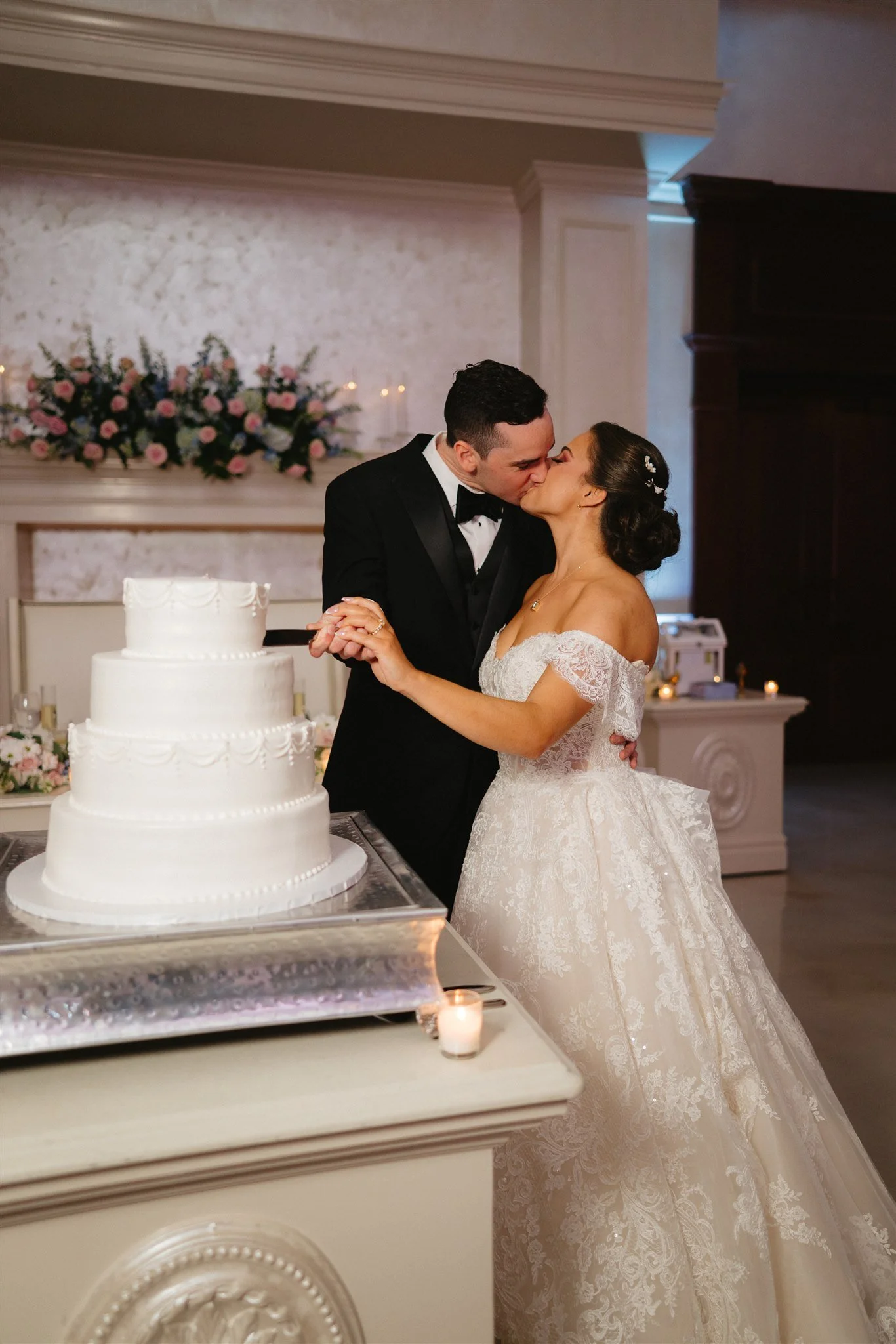 The Palace at Somerset Park-Somerset, NJ-kissing by wedding cake.jpg