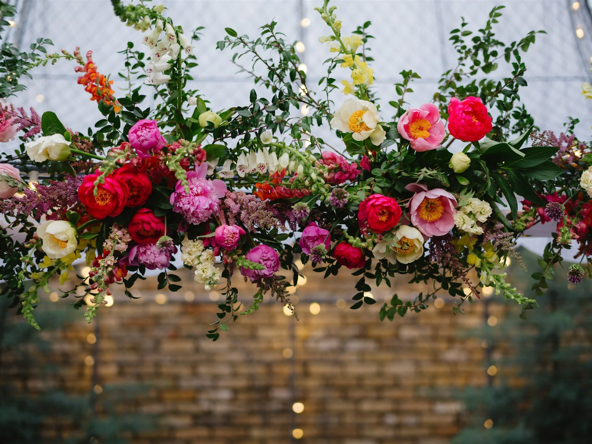 New Hope, PA- Terrain Gardens- wedding flowers on wall.jpg